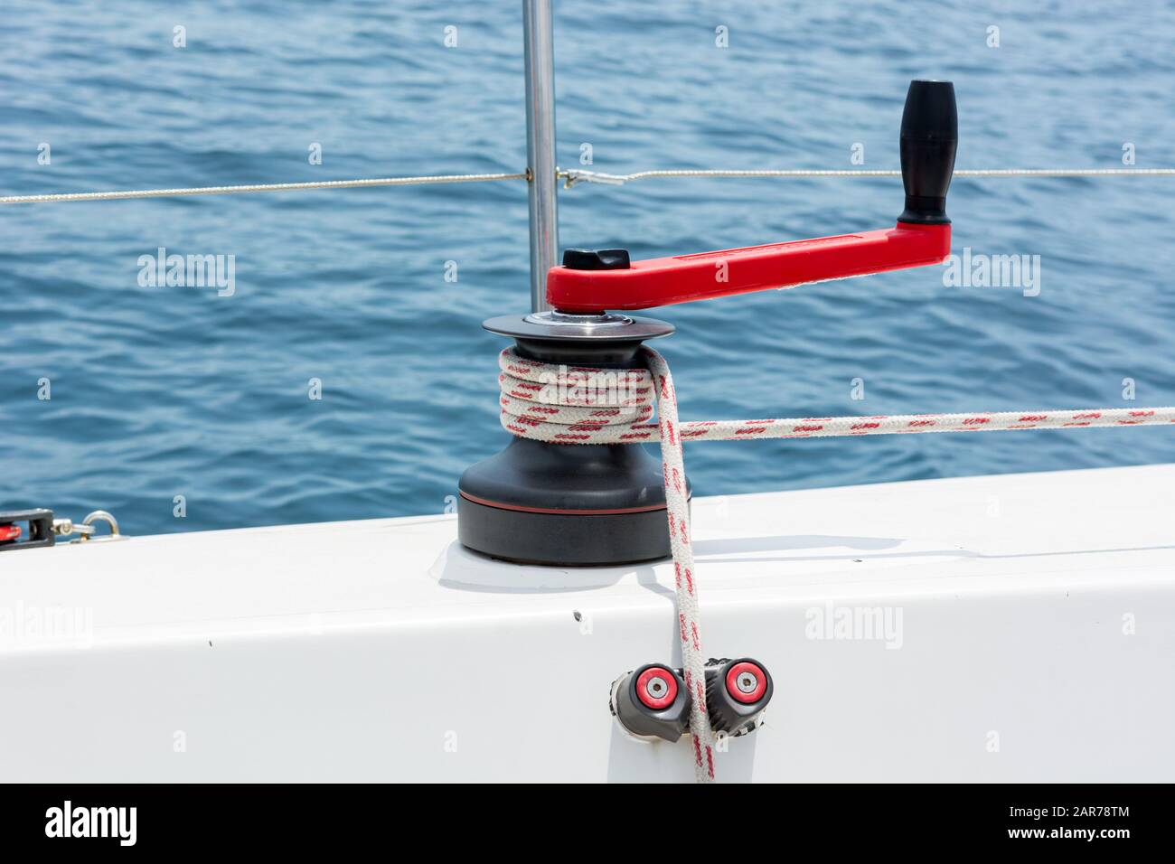 Hand winch on a sailboat while sailing Stock Photo Alamy