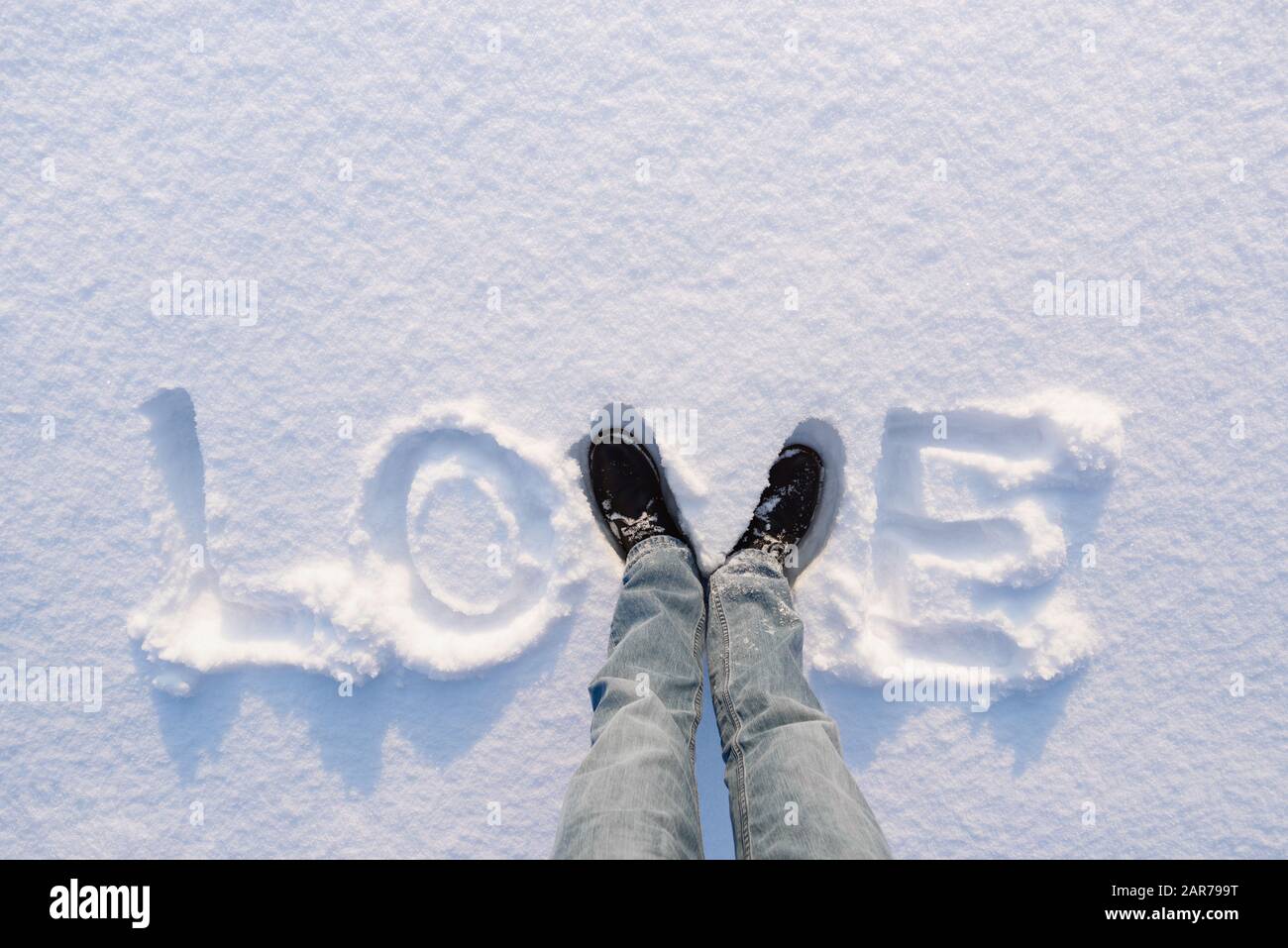 Card Valentine's Day with the word Love. Festive background with a place to insert a congratulatory or advertising text Stock Photo