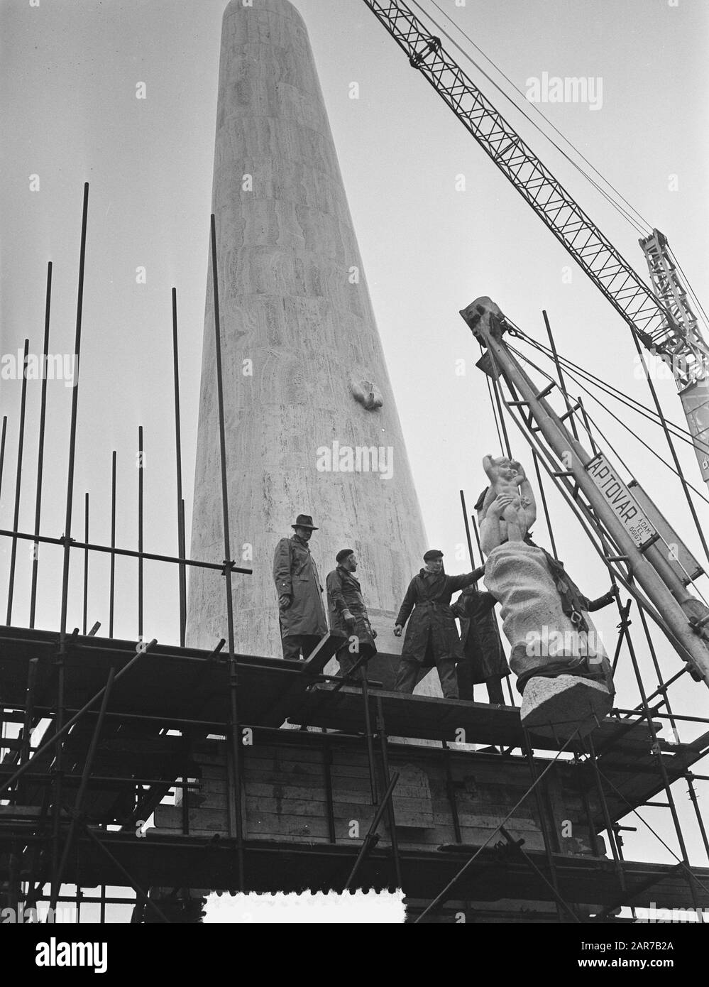 Peace figure placed on column National Monument Dam Date January 12