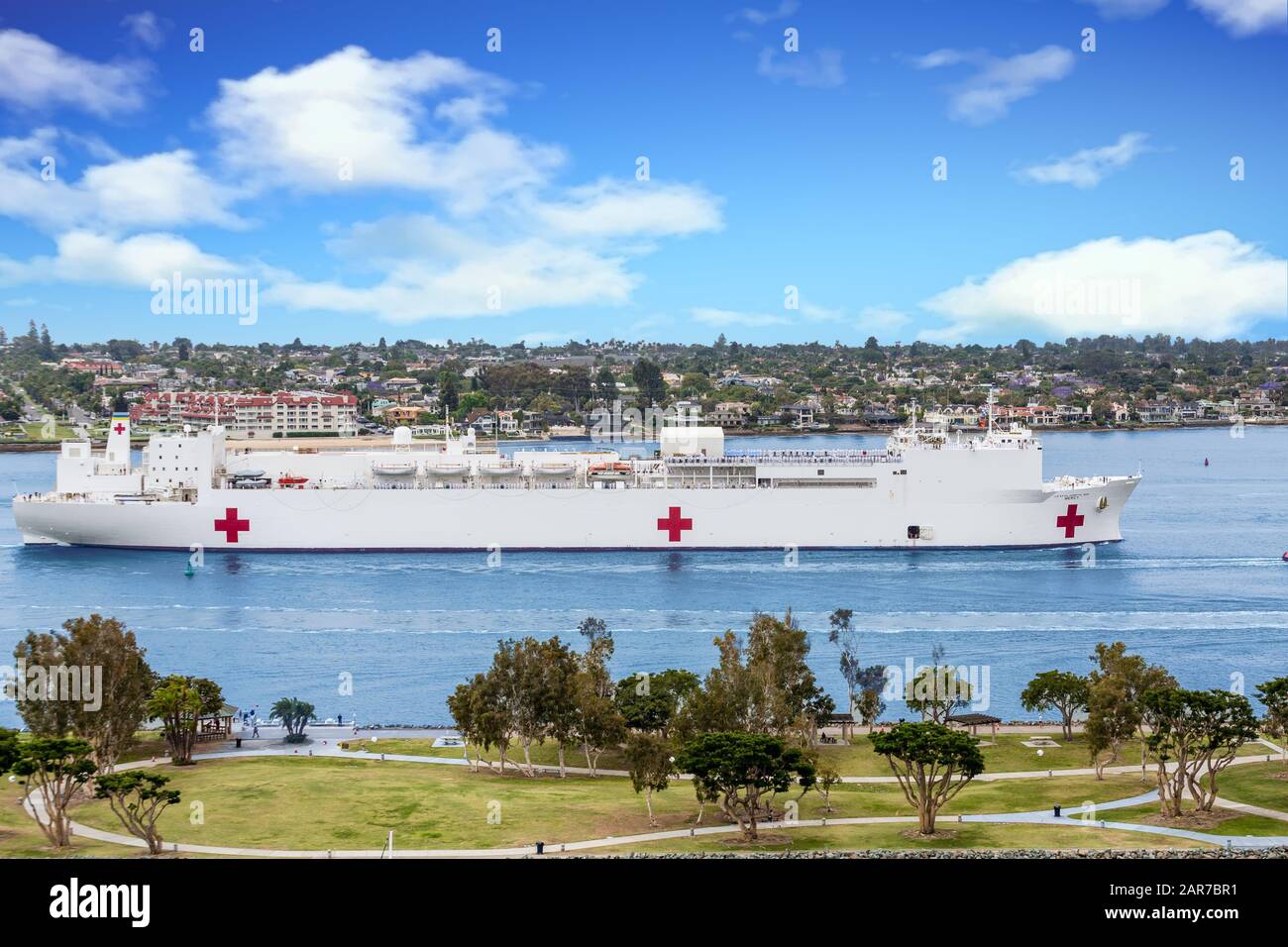 United States Naval Ship Mercy sailing into San Diego Harbor Stock