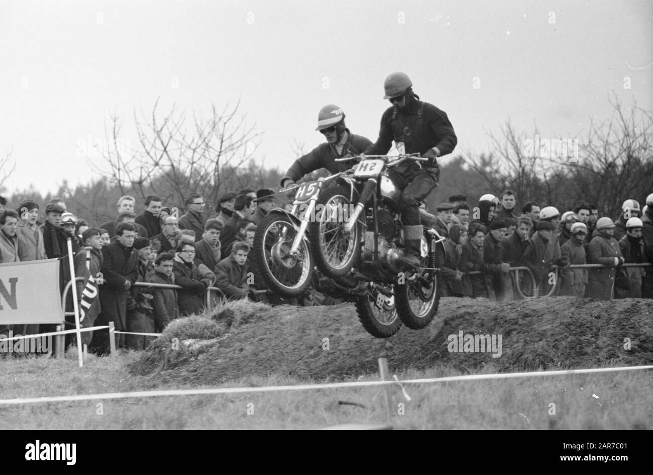 Opening Motorcross season and country match Netherlands against Belgium,  Rob Selling (number 14), Van Ham (number 32) Date: February 25, 1962  Keywords: MOTOCROSS, openings Personal name: Selling, Rob Stock Photo -  Alamy