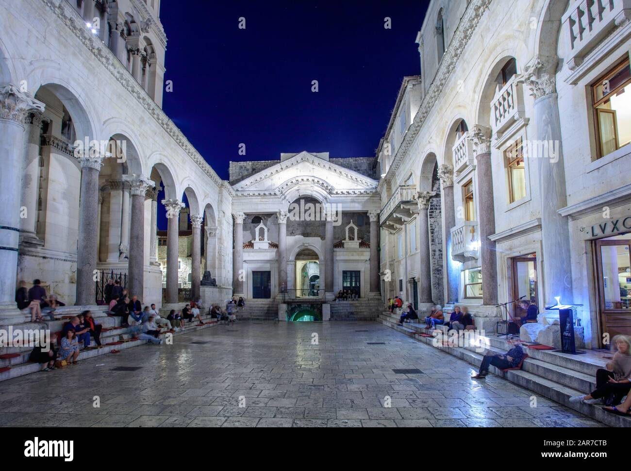 People listen to music in the Diocletian Palace, Split. Croatia Stock Photo