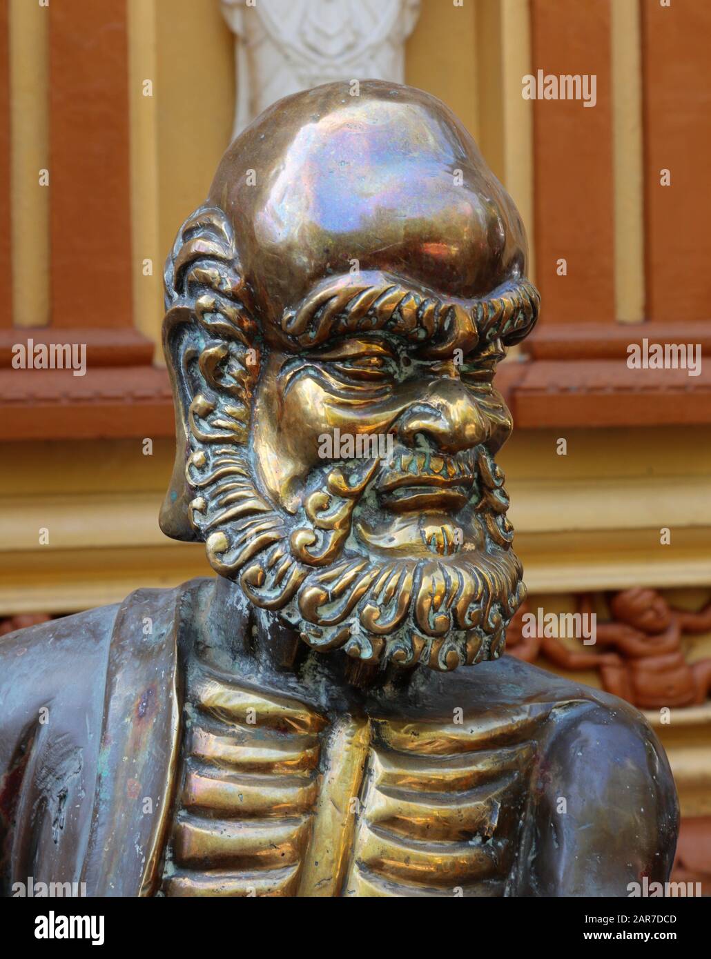 Bronze Statue, possibly a Chinese God or Guardain figure at the front of the Gangaramaya Buddhist temple in Colombo, Sri Lanka Stock Photo