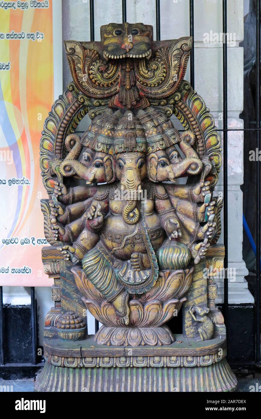 Lord Ganesha, Ganesh, Ganapati, statue, elephant headed Hindu God of beginnings, remover of obstacles in the Gangaramaya Temple, Colombo, Sri Lanka. Stock Photo