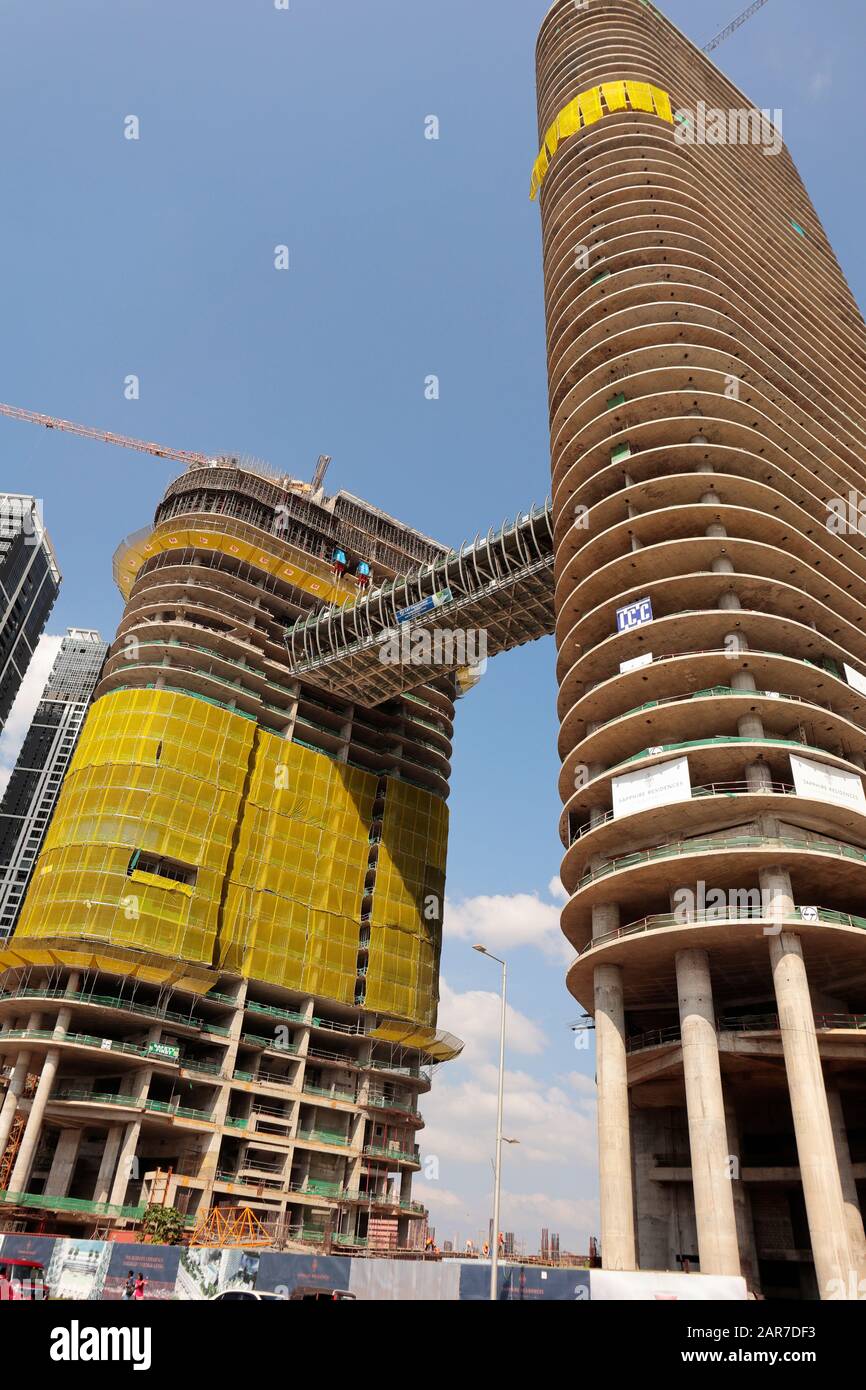 ITC One Hotel under construction in Colombo, Sri Lanka.  A 224 metre high residential luxury apartment tower linked by a 54 metre bridge to a 140 metr Stock Photo