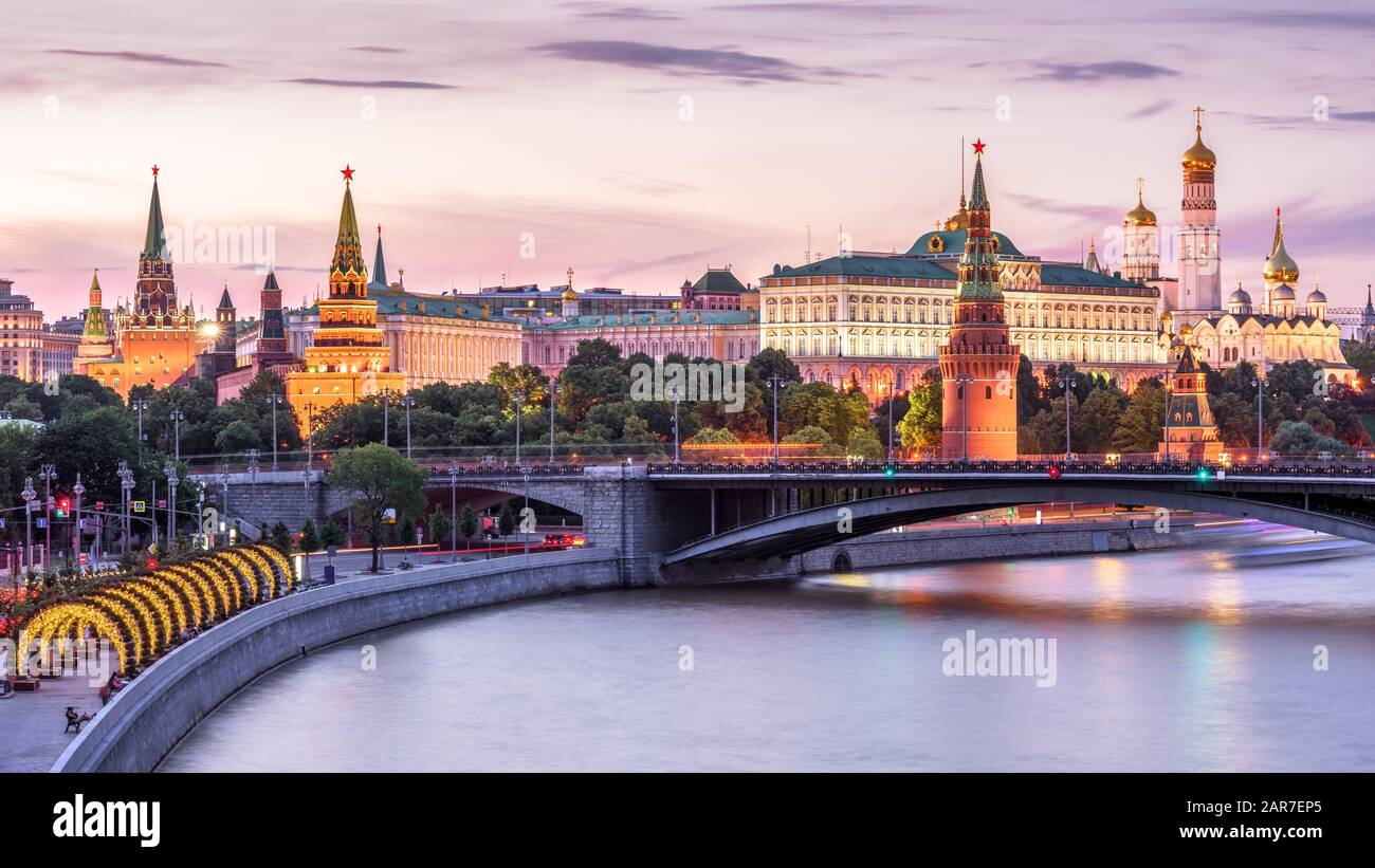 Moscow Kremlin at Moskva River, Russia. Scenery of the Moscow old city at night. Panoramic view of ancient Moscow Kremlin in summer evening. Beautiful Stock Photo
