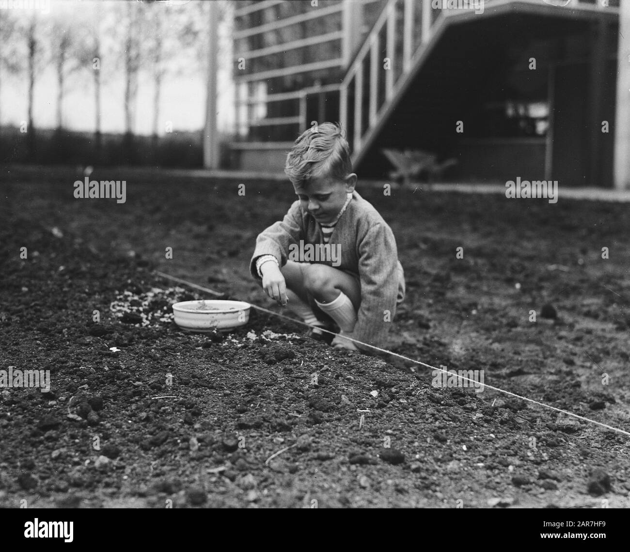 Hands sowing seed Black and White Stock Photos & Images - Alamy
