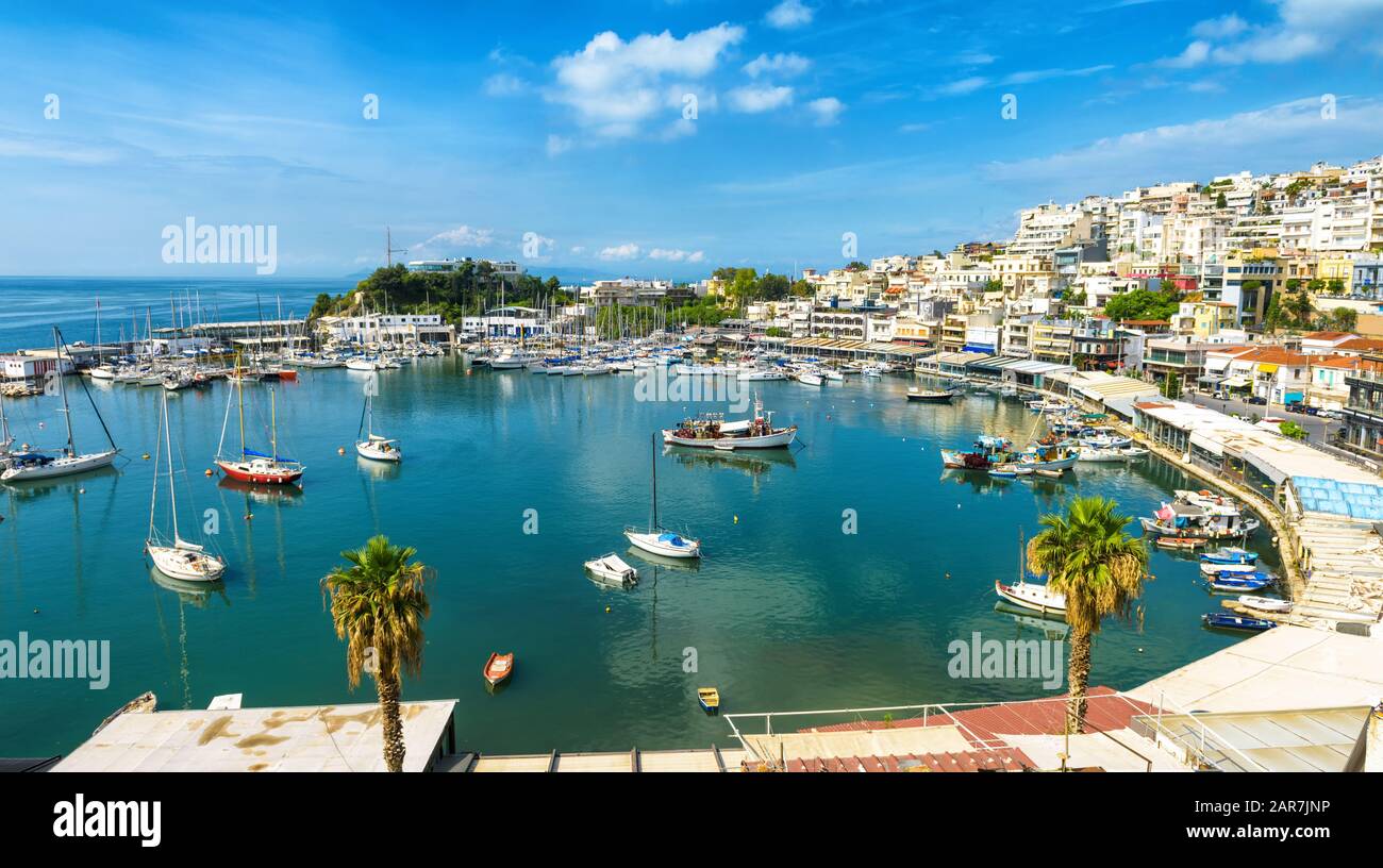 Mikrolimano marina in Piraeus, Athens, Greece. Panoramic view of the beautiful harbor with sail boats. Scenery of the city coast with scenic sea port. Stock Photo