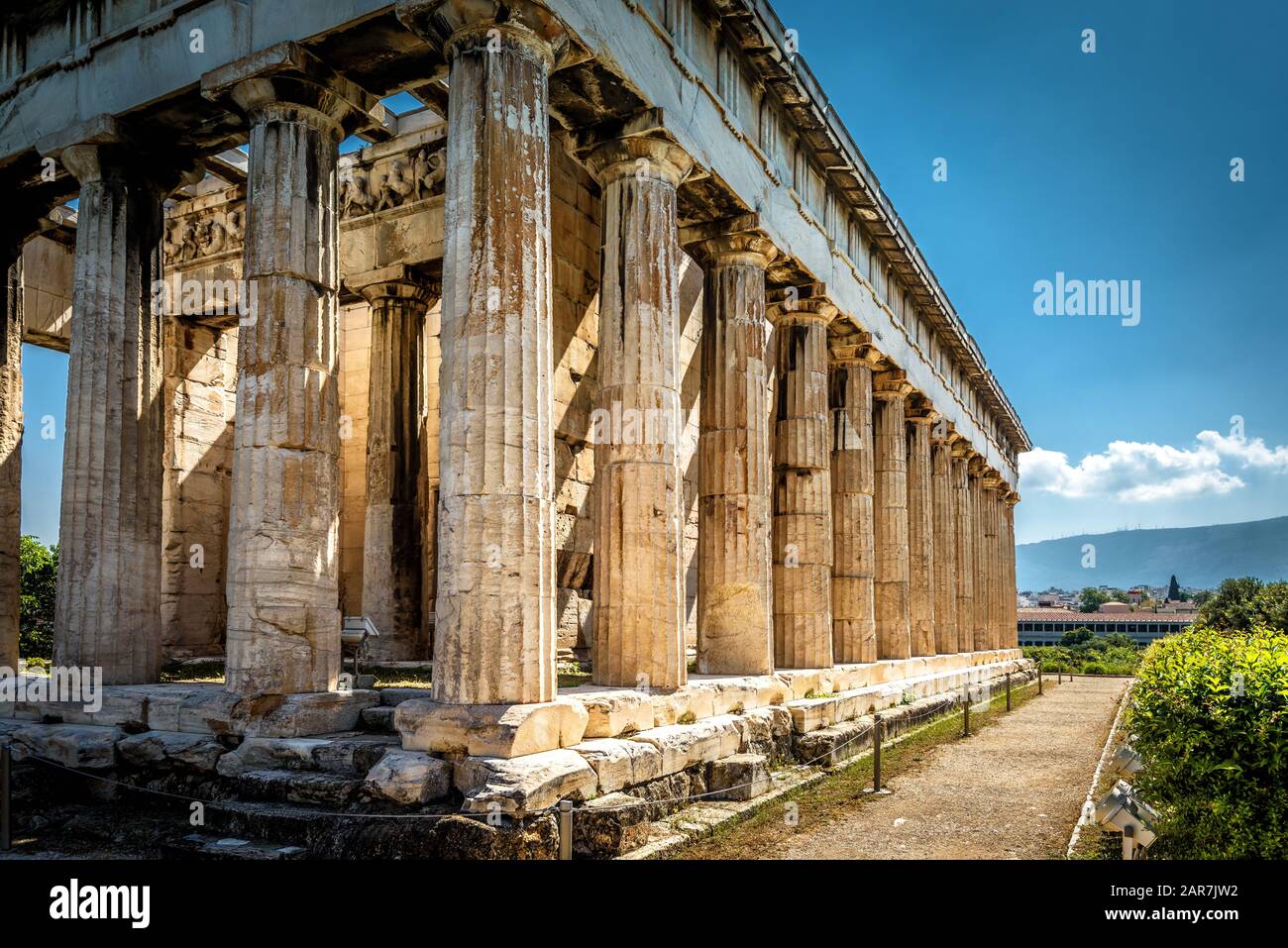 Temple of Hephaestus in Athens, Greece. It is one of the main landmarks of Athens. Sunny view of ancient Greek ruins in Athens centre. Famous historic Stock Photo
