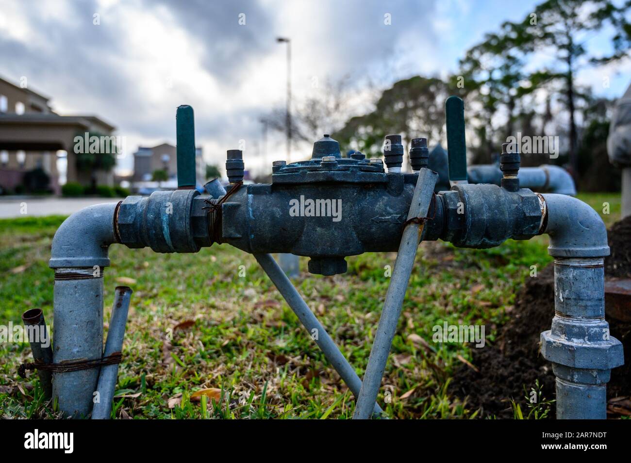 Water main pipe with back flow prevention, double block, and bleed valves Stock Photo Alamy