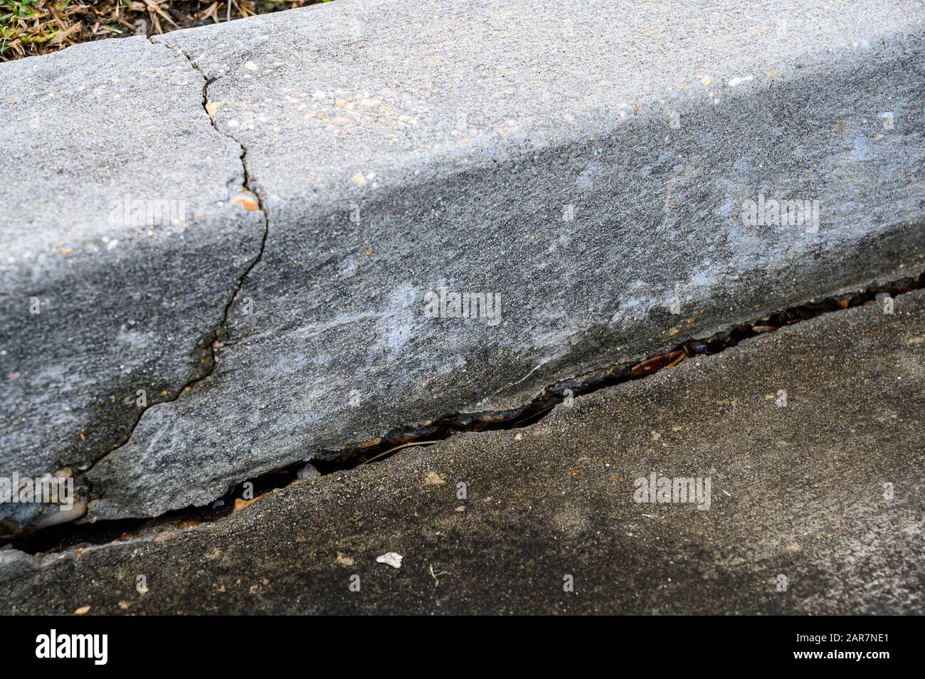 Stress crack along concrete curb joint Stock Photo Alamy