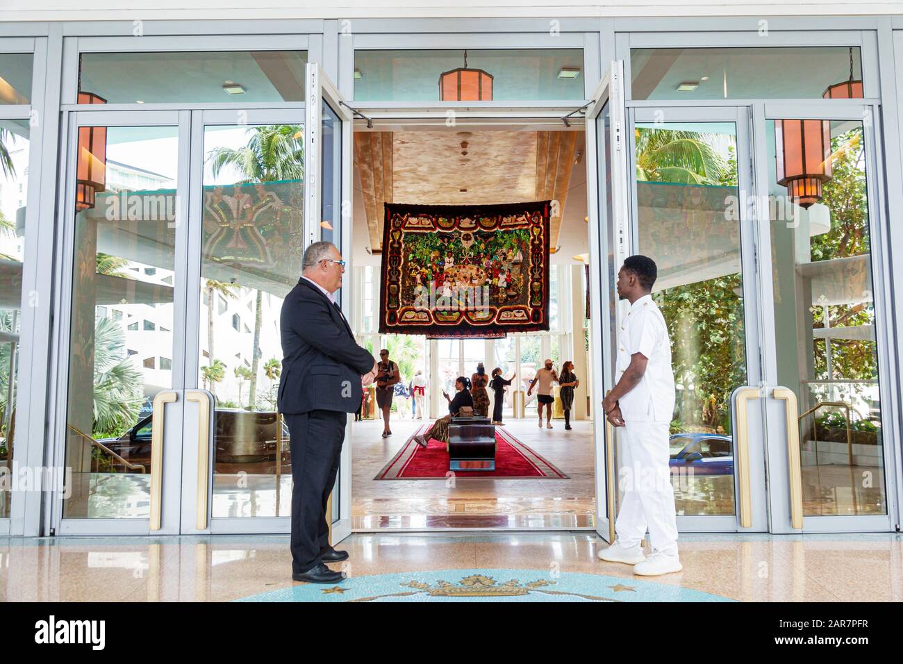Miami Beach Florida,Collins Avenue,Faena District,cultural neighborhood,Faena Hotel,luxury five-star hotel,entrance,doorman,porter,working,uniform,wor Stock Photo