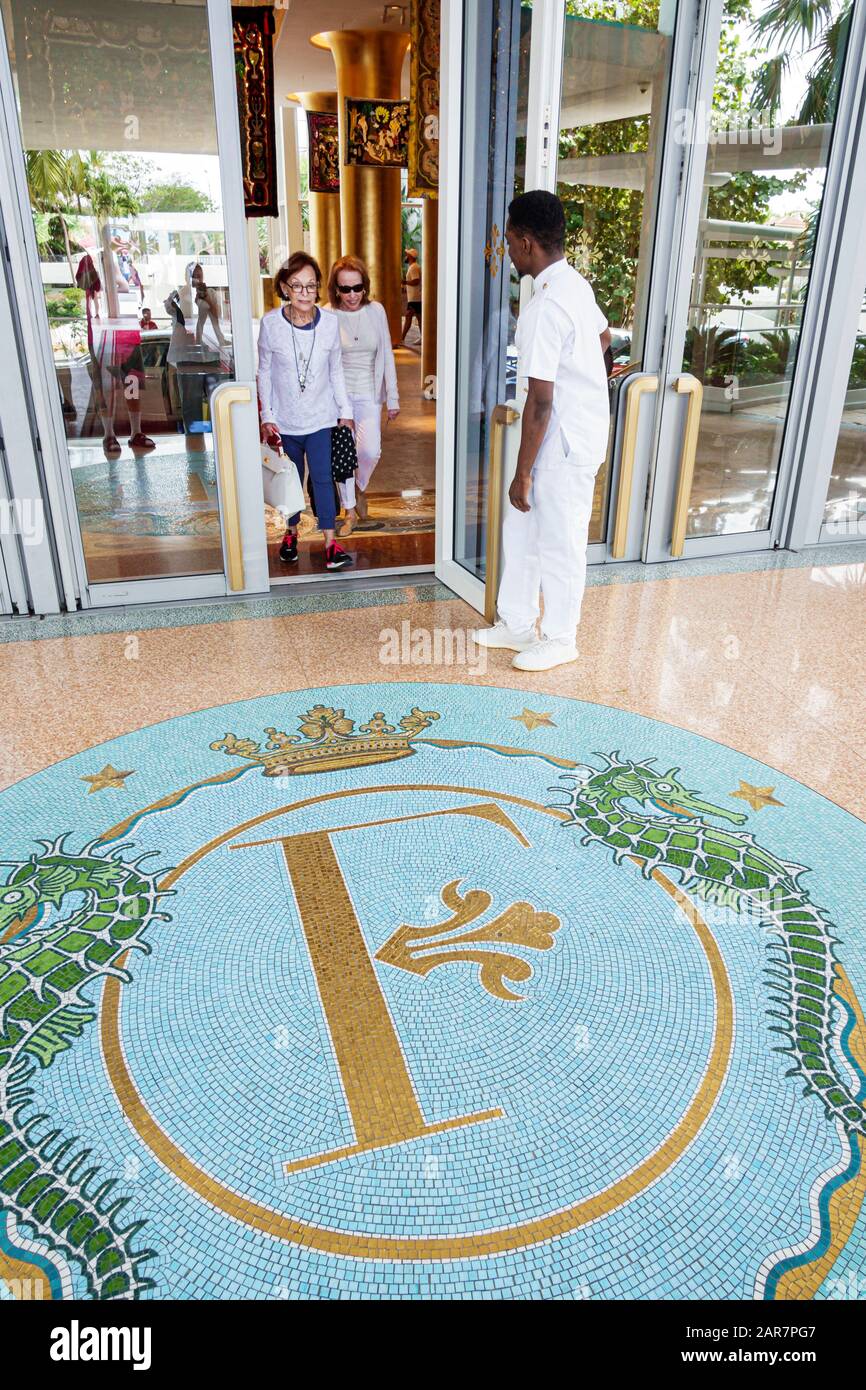 Miami Beach Florida,Collins Avenue,Faena District,cultural neighborhood,Faena Hotel,luxury five-star hotel,entrance,doorman,porter,working,uniform,wor Stock Photo