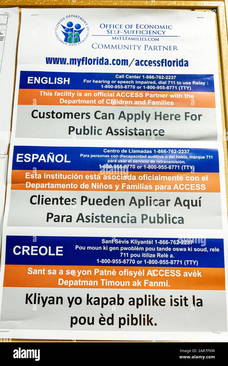 Miami Beach Florida,Miami Beach,Community Health Center,sign information,English Spanish Creole multiple languages,public assistance,FL191231144 Stock Photo