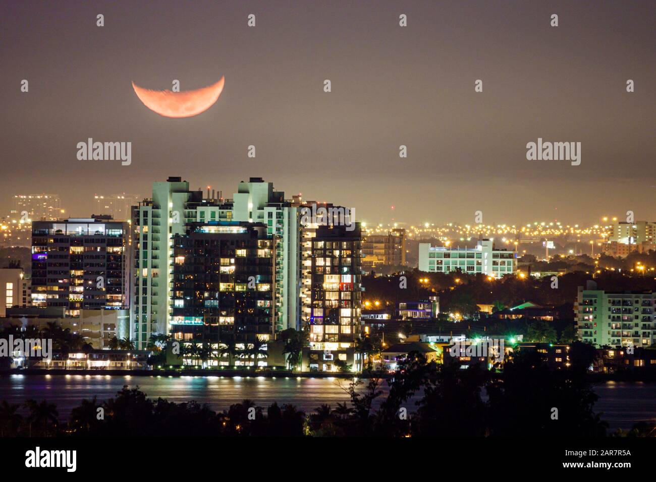 Miami Beach Florida,Bay Harbor Island,city skyline,crescent moon setting moonset,night,FL191231167 Stock Photo