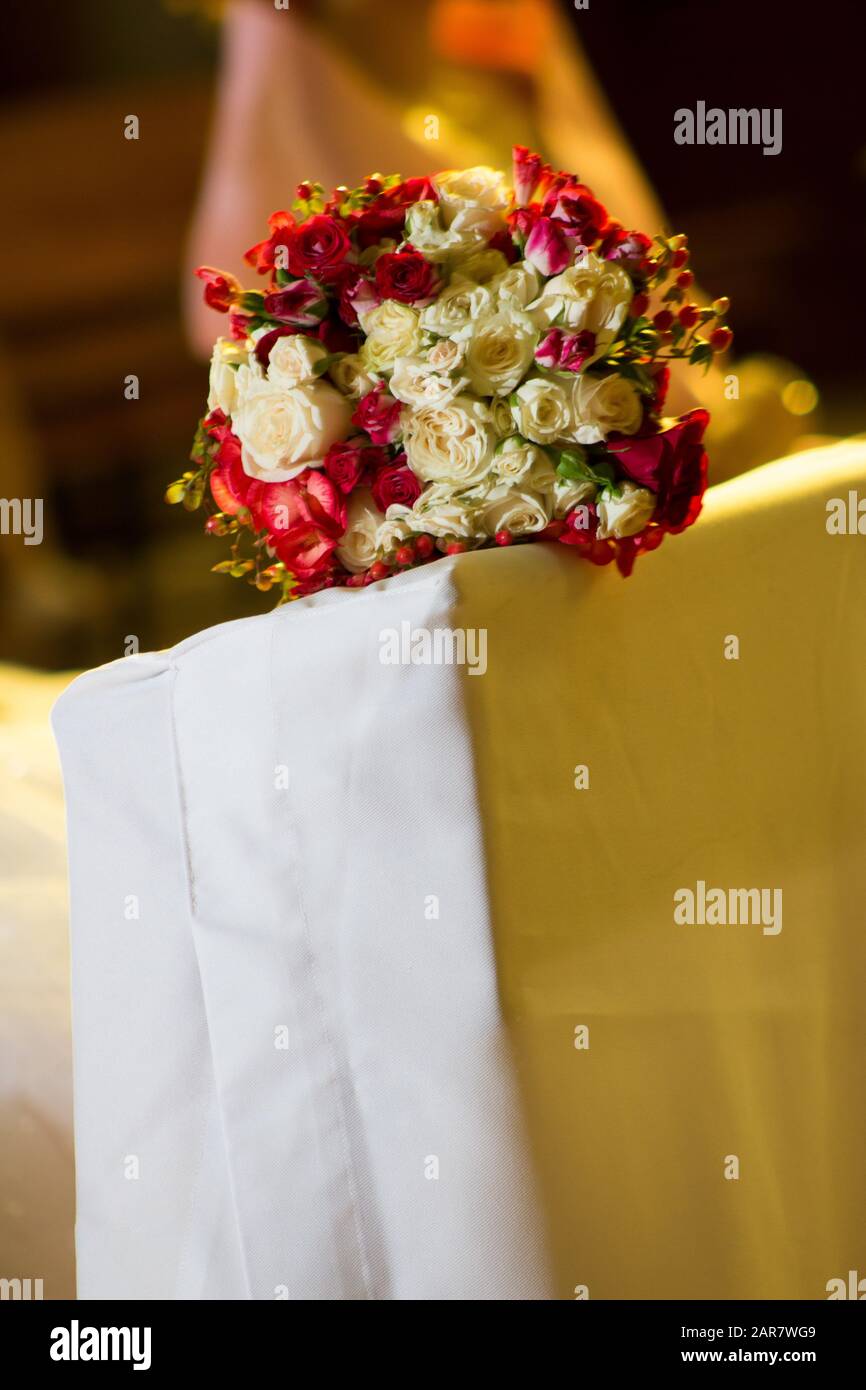 bouquet of red and white roses from a ceremony Stock Photo - Alamy