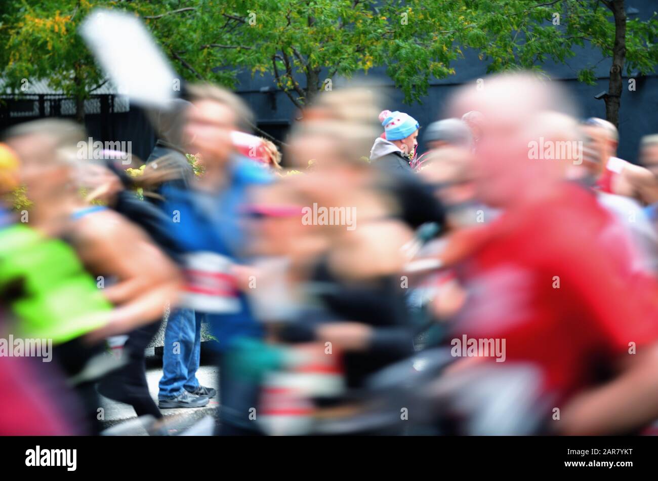 Chicago, Illinois, USA. Runners flowing down Jackson Boulevard provide a river of color during the 2019 Chicago Marathon in the city's Loop. Stock Photo