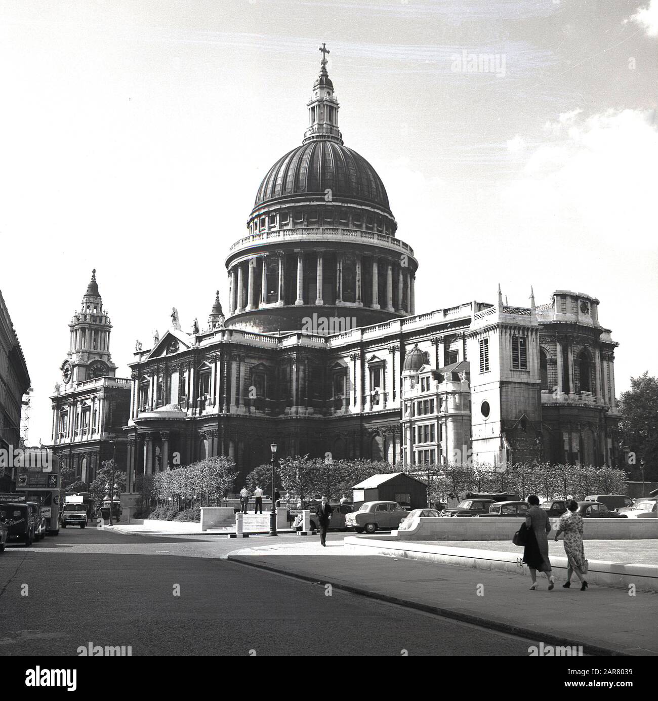 1950s, historical, post-war London and a view of St Paul's Cathedral, with its famous dome, the seat of the Bishop of London, England, UK. Designed by Christopher Wren and built in the English Baroque style of architecture, the church is located in Ludgate Hill, the highest point of the City of London. Stock Photo