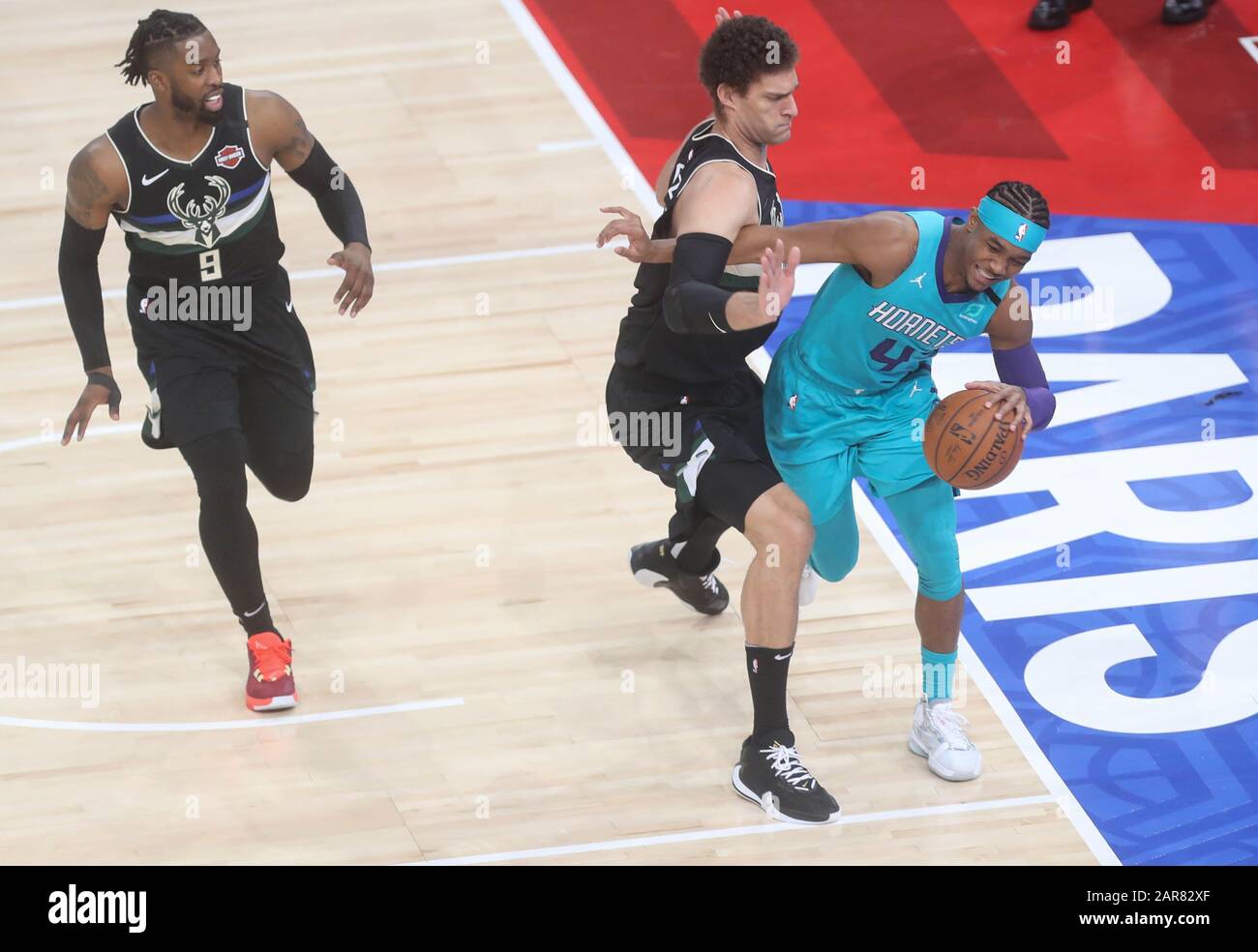 Devonte' Graham of Charlotte Hornets  and   Brook Lopez  , Wesley Matthews of Milwaukee Bucks during the NBA Paris Game 2020 basketball match between Milwaukee Bucks and Charlotte Hornets on January 24, 2020 at AccorHotels Arena in Paris, France - Photo Laurent Lairys / DPPI Stock Photo