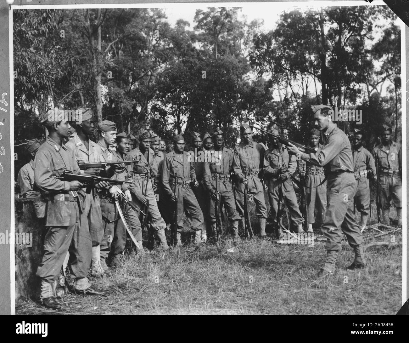 Dutch-Indian troops receive weapons instruction [training camp Australia?] Annotation: Repronegative. See 149-1154 Date: 1945 Keywords: natives, military, World War II Stock Photo