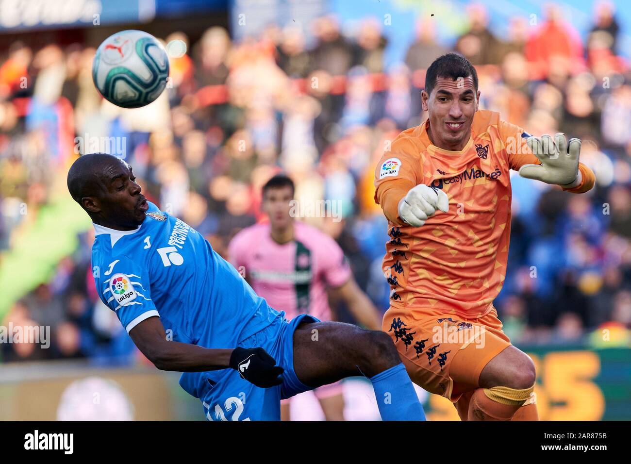 Allan-Romeo Nyom of Getafe FC and Joel Robles of Real Betis Balompie are seen in action during the La Liga match between Getafe CF and Real Betis Balompie at Coliseum Alfonso Perez in Getafe. (Final score; Getafe CF 1:0 Real Betis Balompie) Stock Photo