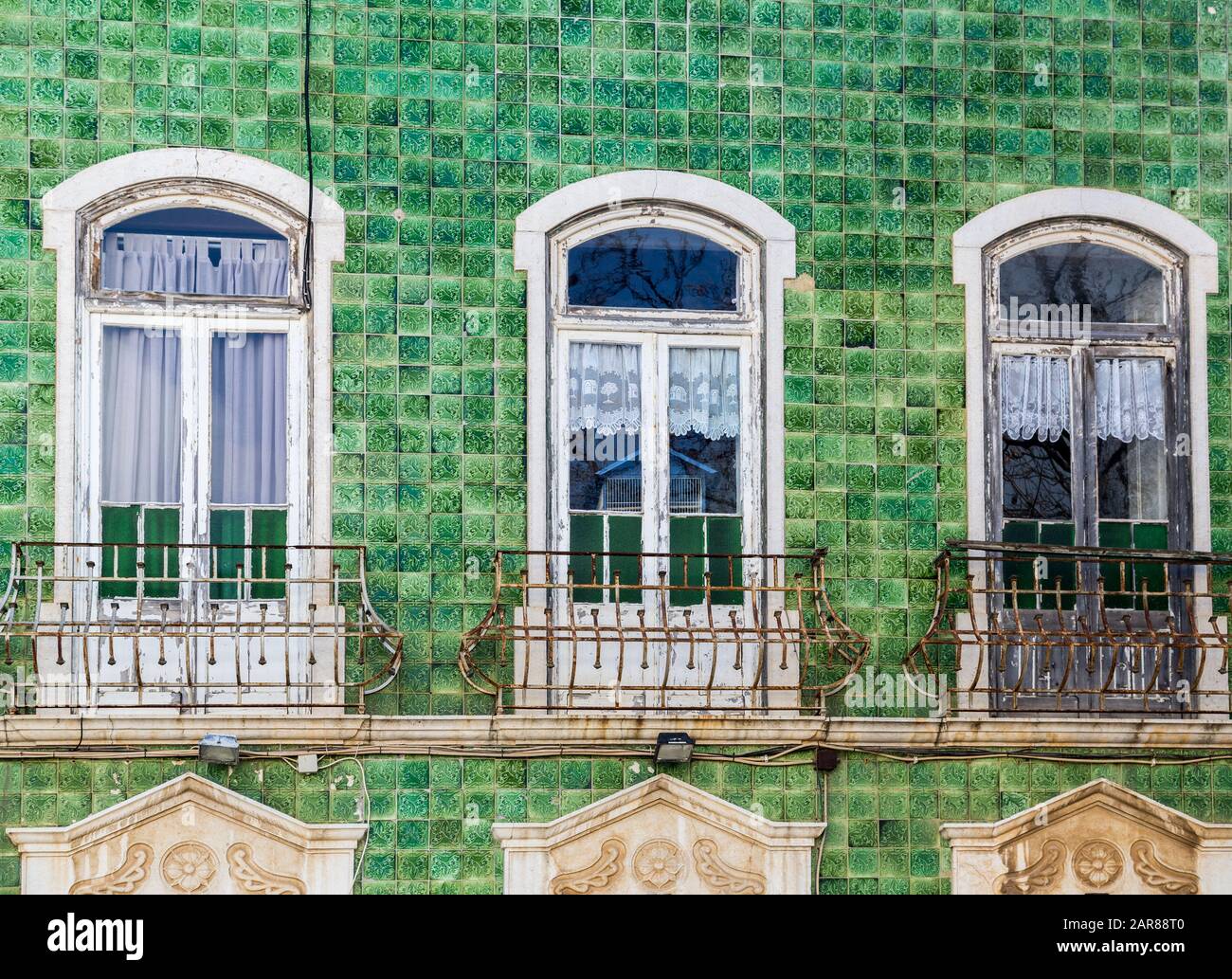 Patterned tiles on wall of house, Lagos, Algarve, Portugal Stock Photo