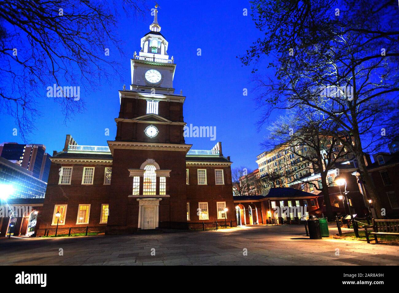 Illuminated Independence Square and Hall at night during winter in Philadelphia building where the United States Constitution was signed Stock Photo