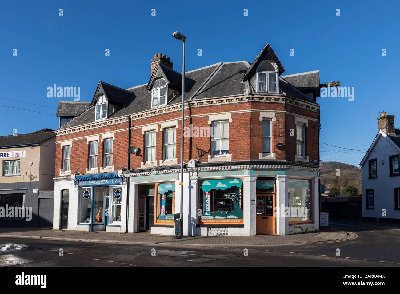 Music shop and model shopon corner of roads, Abergavenny, Wales, UK