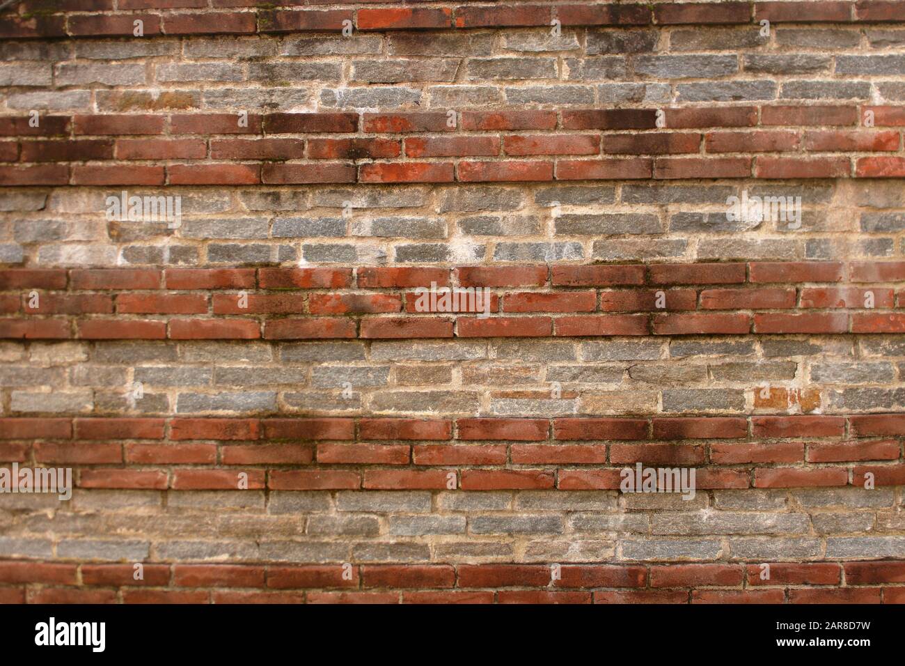 18th century terracotta bricks wall pattern Stock Photo
