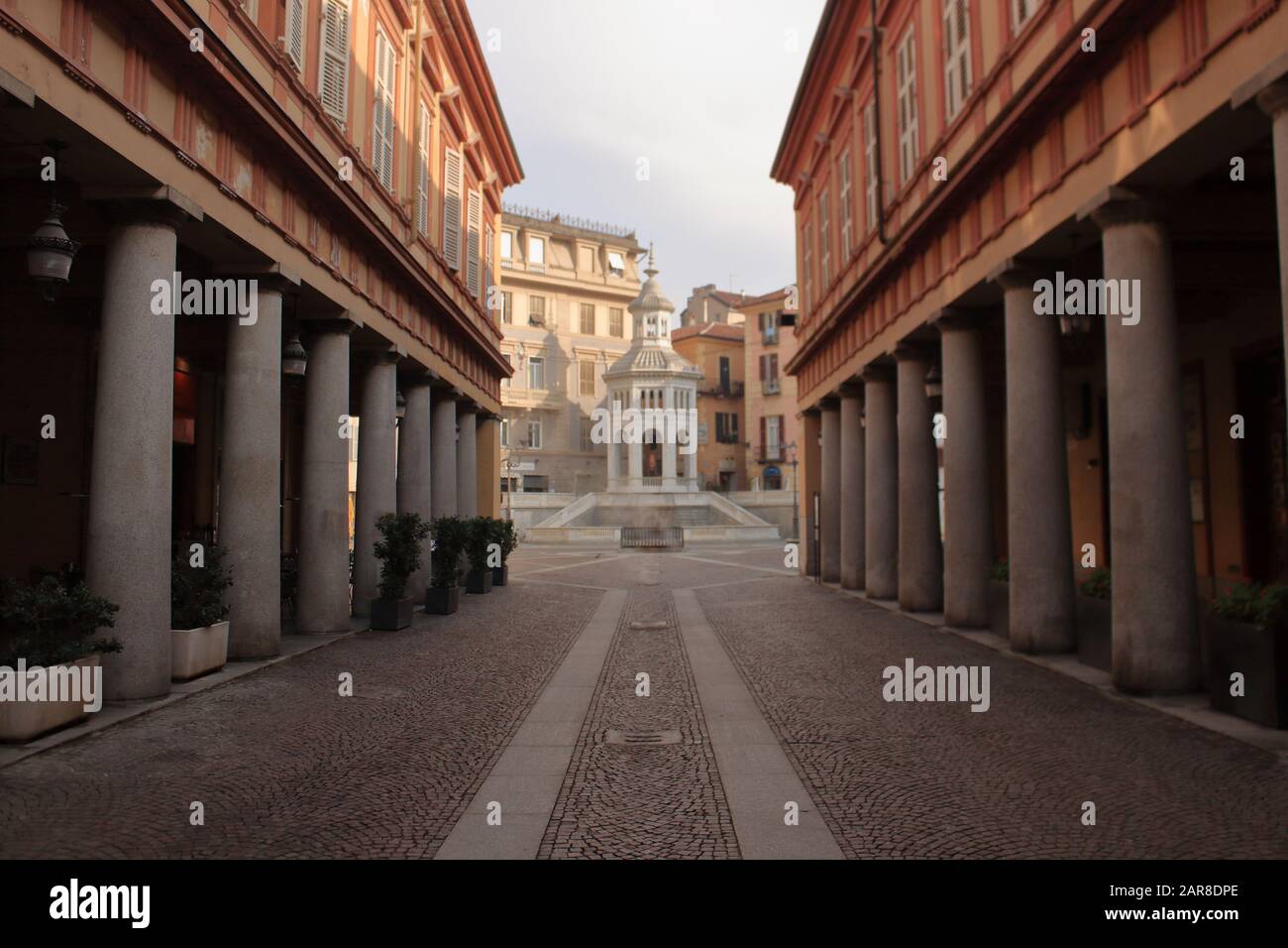 Acqui Terme, famous Italian spa town from Roman times. Central square with a fountain with natural boiling iodine rich water! Stock Photo