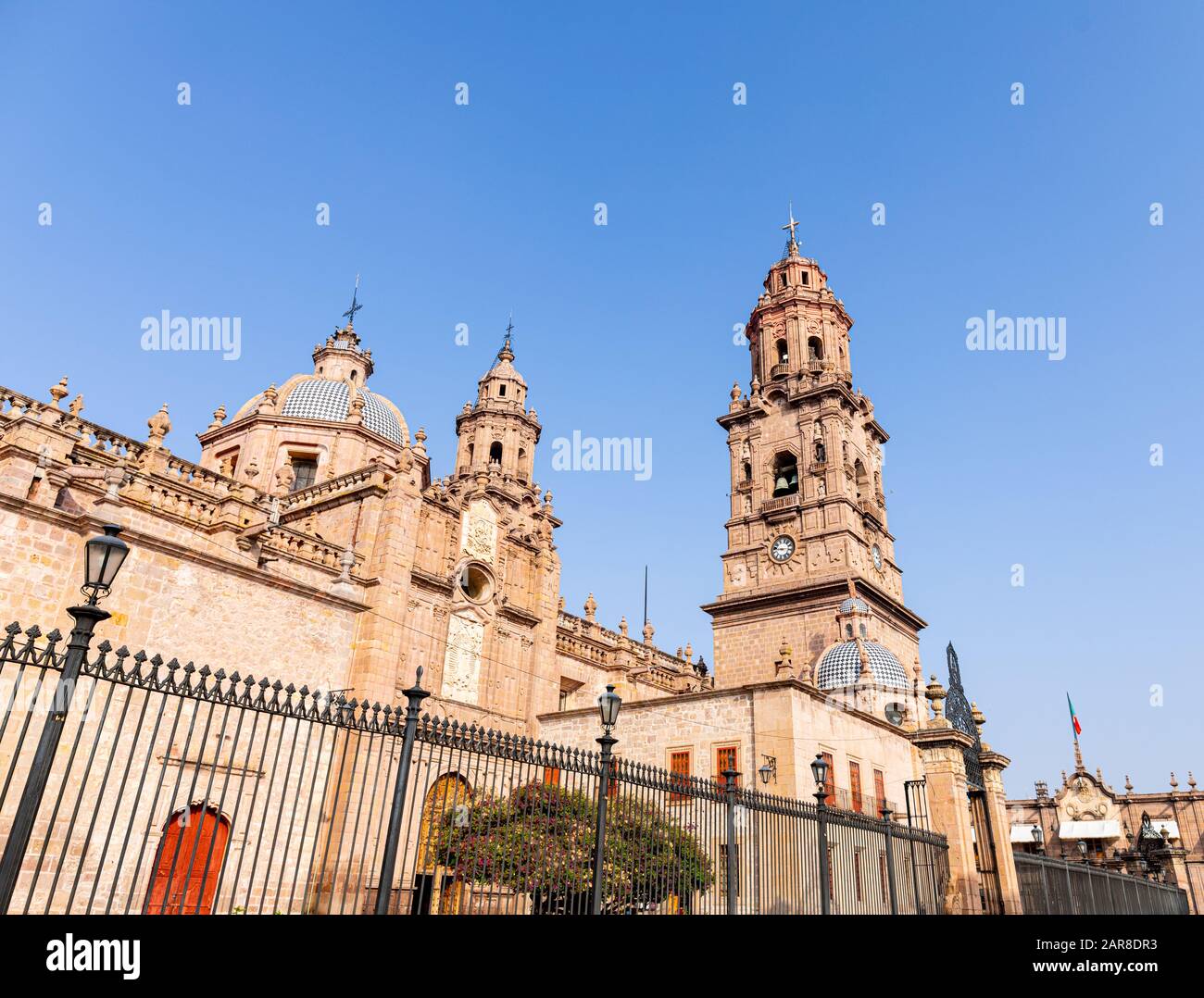 The towers of the Morelia Cathedral against a blue sky, in the Mexican