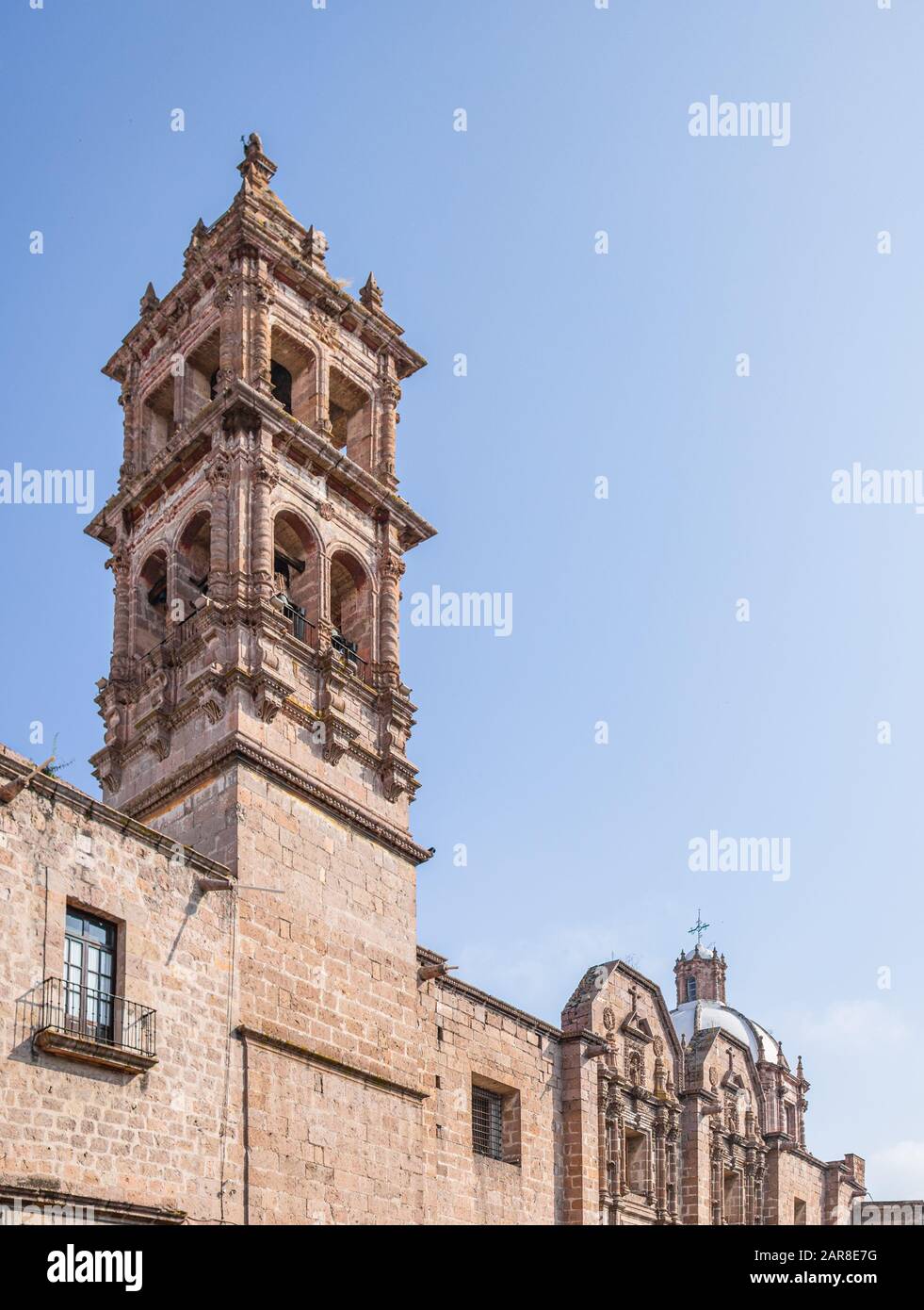 The tower of the Templo Las Monjas against  a blue sky, in the Mexican City of Morelia, state of Michoacan, Mexico Stock Photo