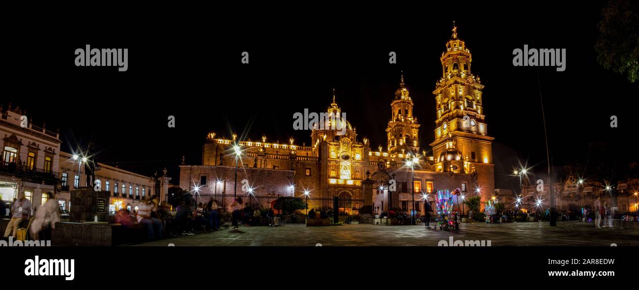 The Morelia Cathedral at night, as seen from the plaza Melchor Ocampo, in the Mexican state of Michoacan Stock Photo