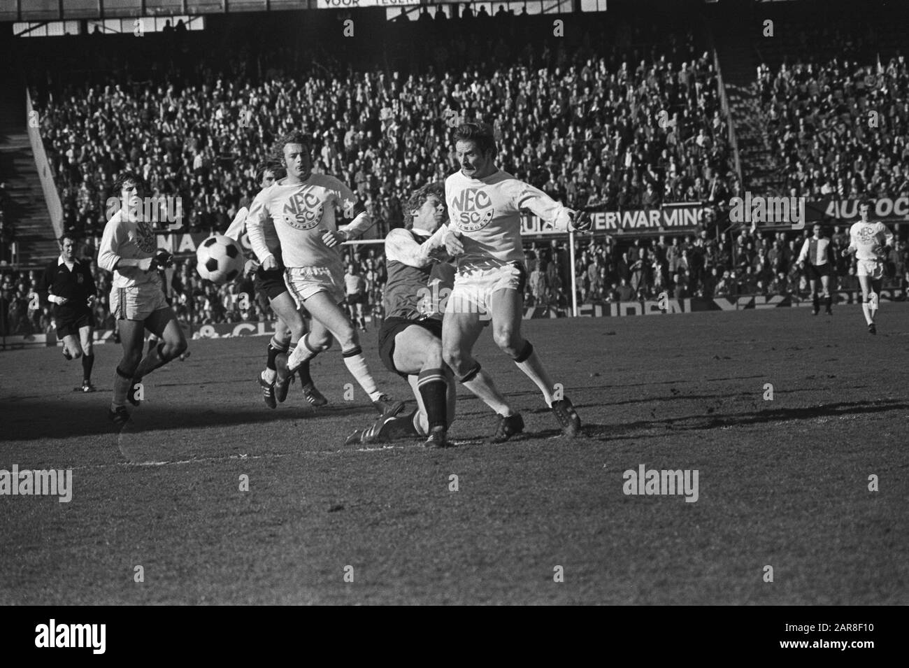 Feyenoord v NEC: 2-0  Game moment Date: 27 February 1977 Location: Rotterdam, Zuid-Holland Keywords: sport, football, footballers Stock Photo