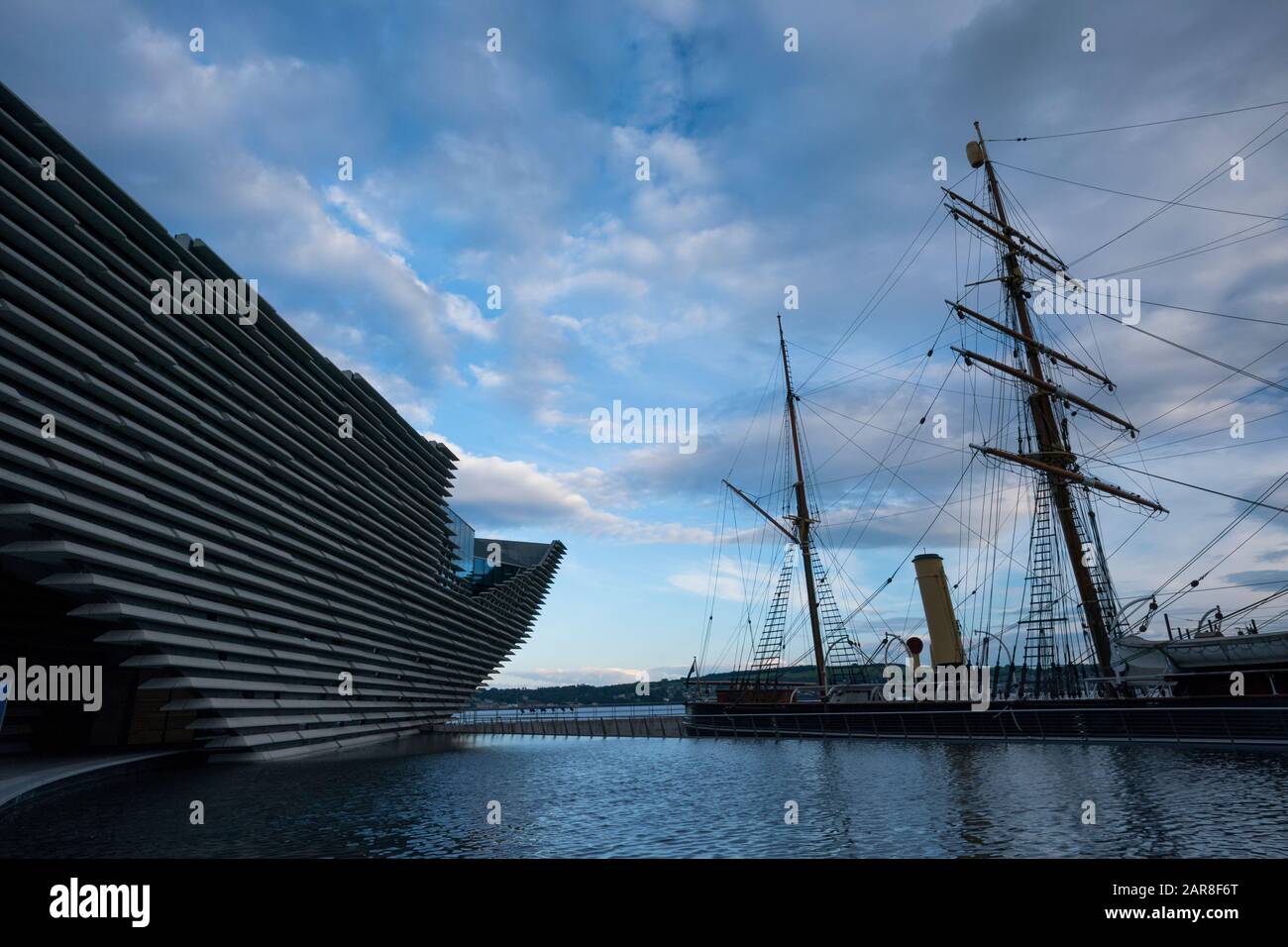 Dundee, United Kingdom - June 19, 2019: The restored RRS Discovery ship that Captain Scott sailed to Antarctic with Shackelton sits in the water next Stock Photo