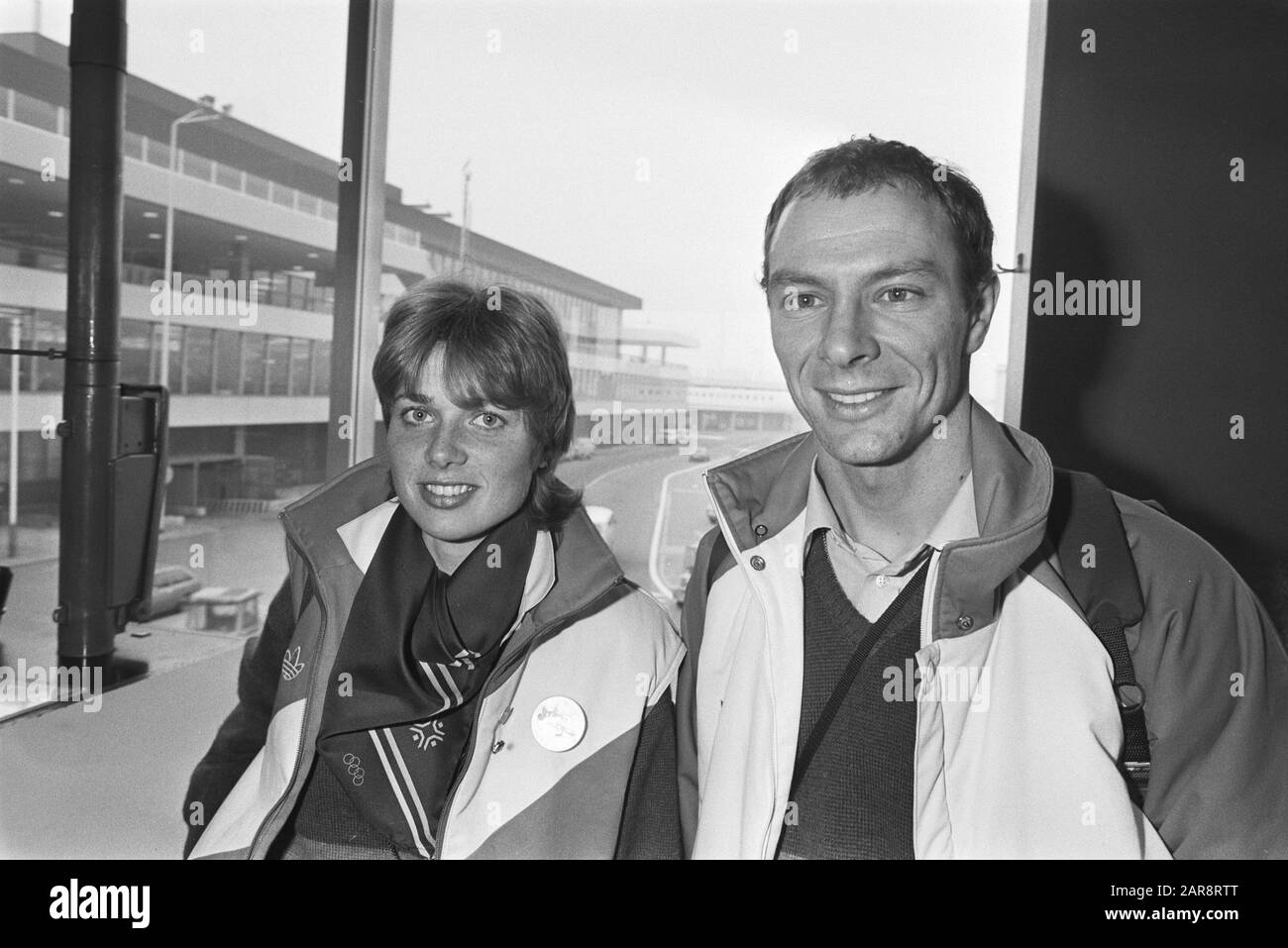 Return Olympic team from Sarajevo at Schiphol Airport; Ria Visser and Hilbert van der Thumb upon arrival Date: 20 February 1984 Location: Noord-Holland, Schiphol Keywords: skating, sport Personal name: Thumb, Hilbert van der, Fisherman, Ria Stock Photo