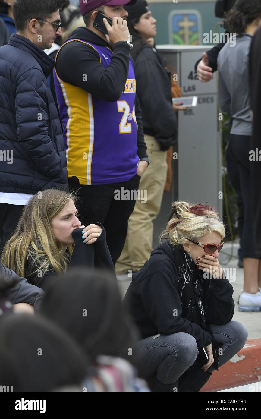 FILE Calabasas, United States. 26th Jan, 2020. Bystanders hold back