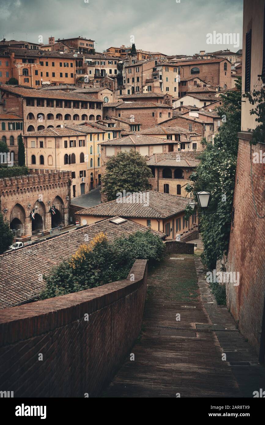 Street view with old buildings in Siena, Italy Stock Photo Alamy