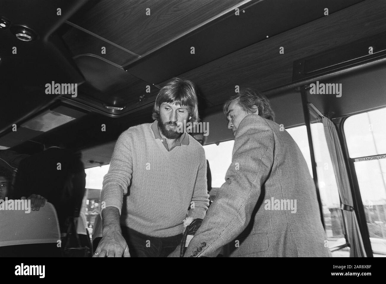Arrival HSV Hamburg at Schiphol in connection with Europa Cup III match  Trainer Ernst Happel with (left) Manfred Kaltz Annotation: On transit to Athens where the final against Juventus would take place Date: 29 September 1981 Location: Noord-Holland, Schiphol Keywords: trainers, footballers Personal name: Happel, Ernst, Kaltz, Manfred Stock Photo