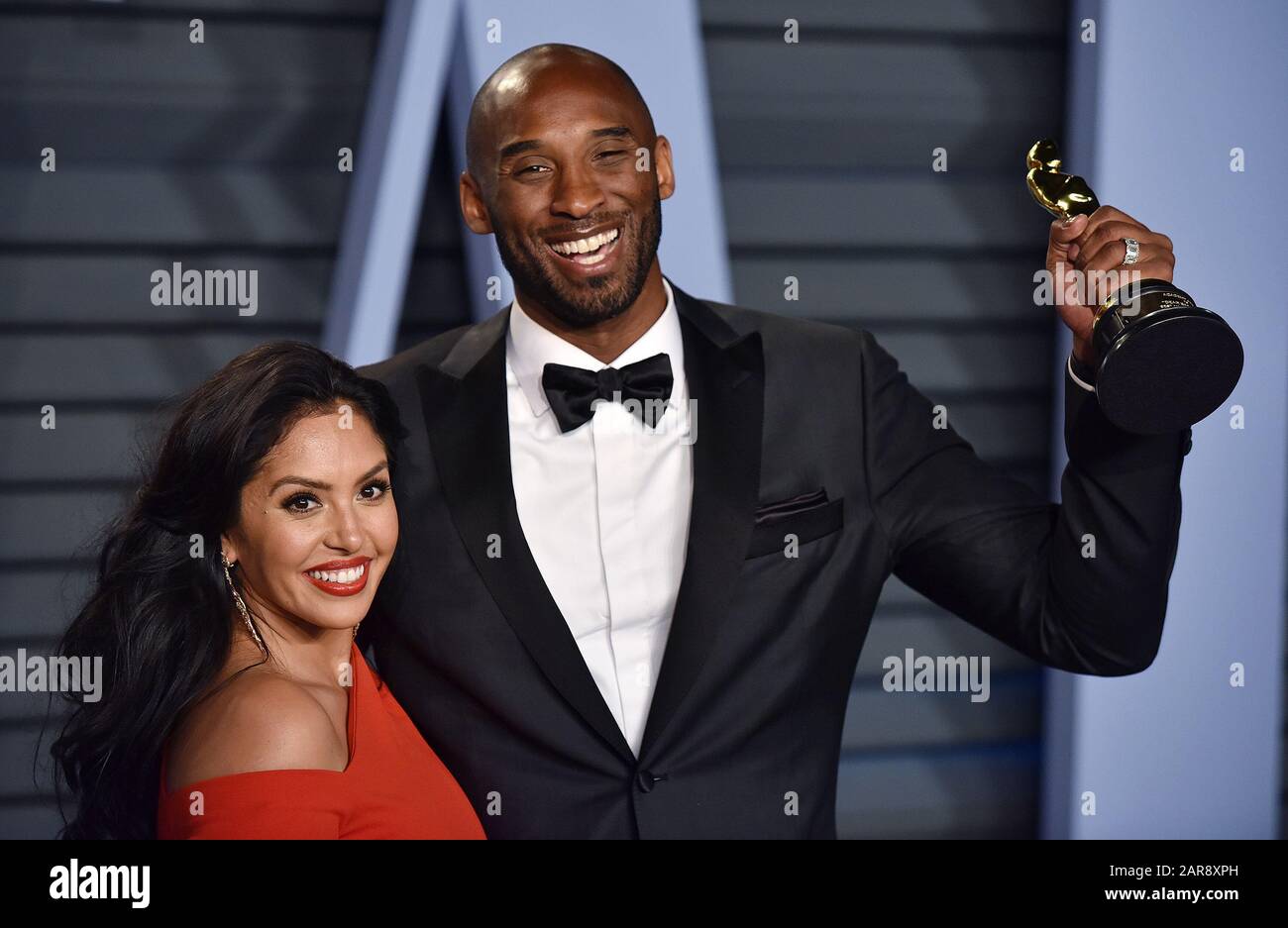 FILE: Los Angeles, United States. 26th Jan, 2020. In this March 4, 2018 file photo, Kobe Bryant (R) and his wife Vanessa hold up his Oscar for Best Documentary Short as they arrive for the Vanity Fair Oscar Party at the Wallis Annenberg Center for the Performing Arts in Beverly Hills, California. Kobe Bryant was killed in a helicopter crash with his 13-year-old daughter Gianna in Calabasas, California on January 26, 2020. Photo by Christine Chew/UPI Credit: UPI/Alamy Live News Stock Photo