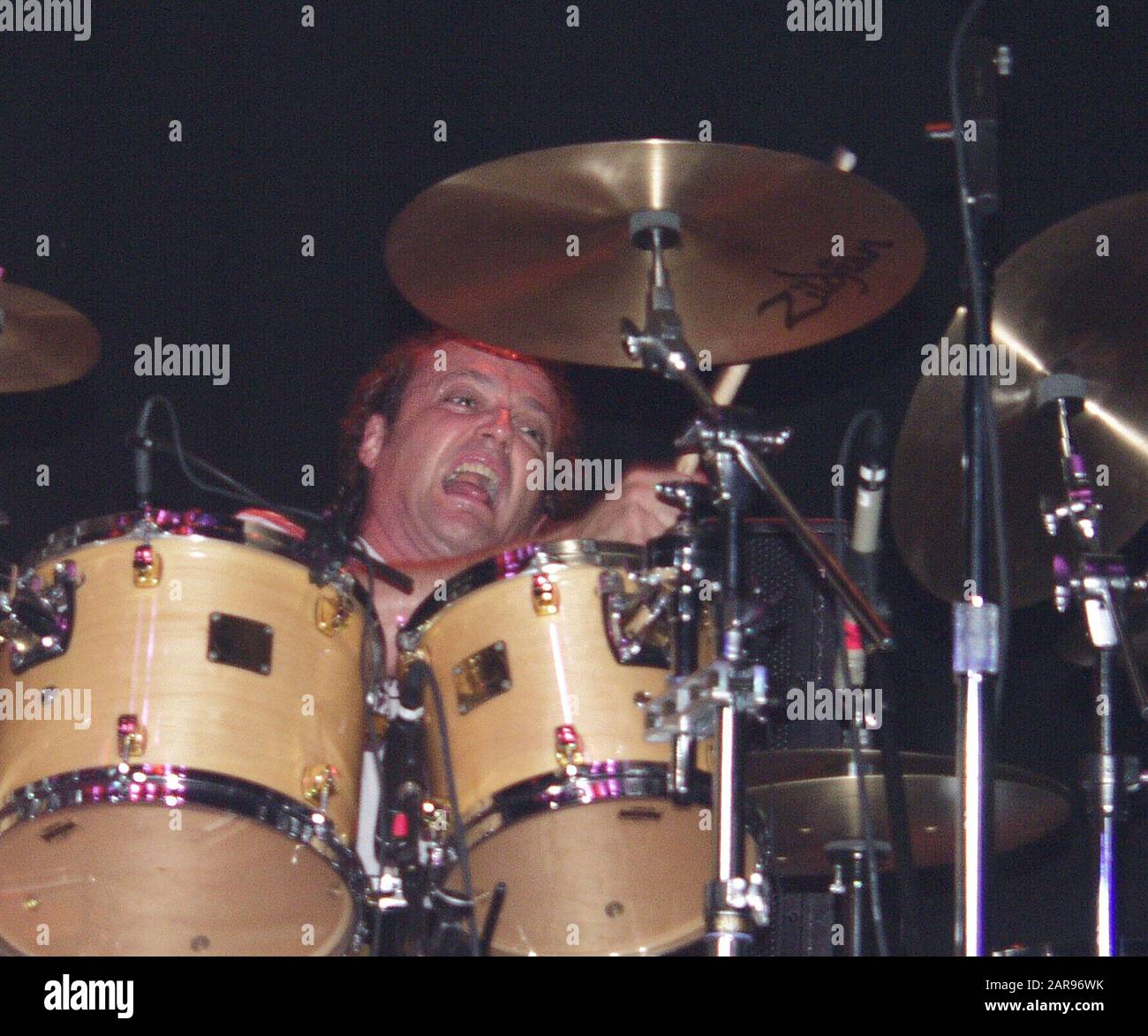 SEPTEMBER 15: Matt Frenette of Loverboy performs at Lakewood Amphitheatre in Atlanta, Georgia on September 15, 2002.  CREDIT: Chris McKay / MediaPunch Stock Photo