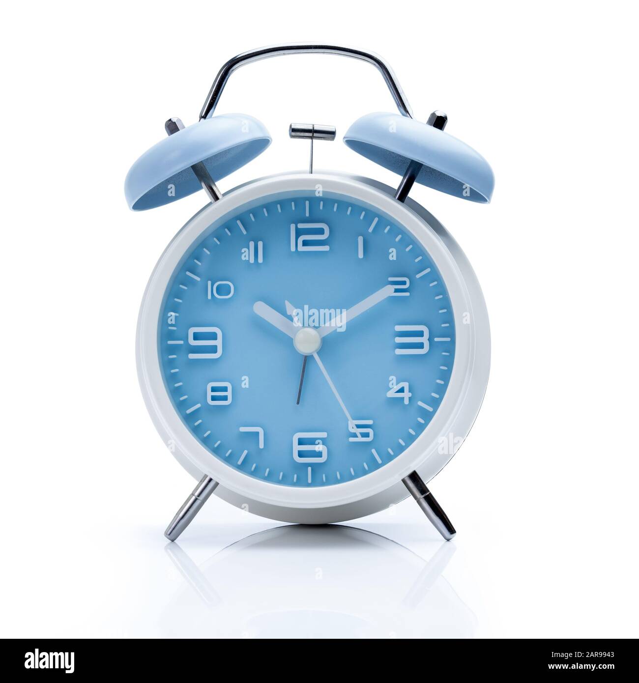 Old fashioned alarm clock on white background Stock Photo - Alamy