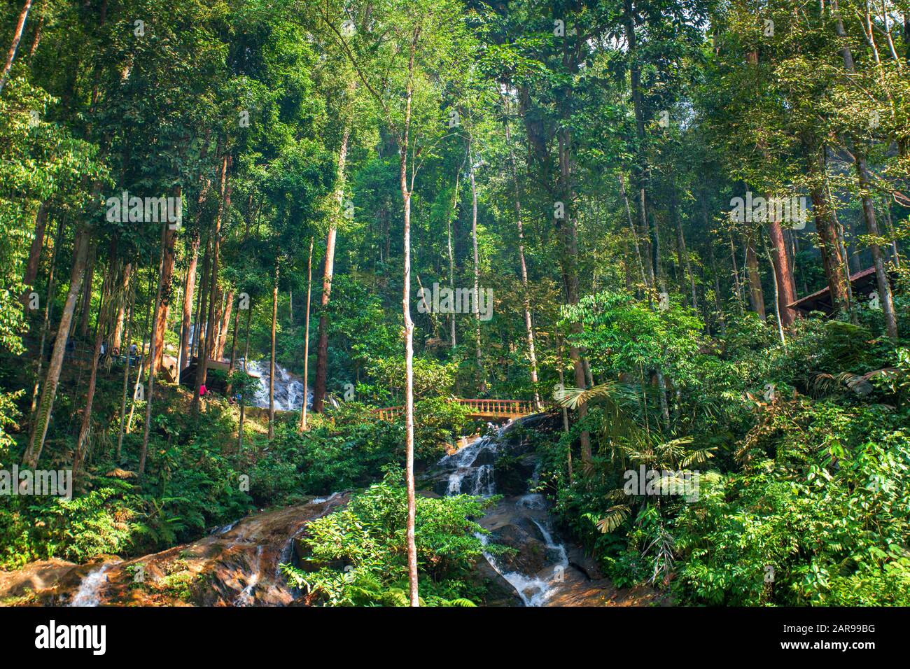 Kancing Fall People enjoying the breathtaking scenery of the tropical Kancing ...