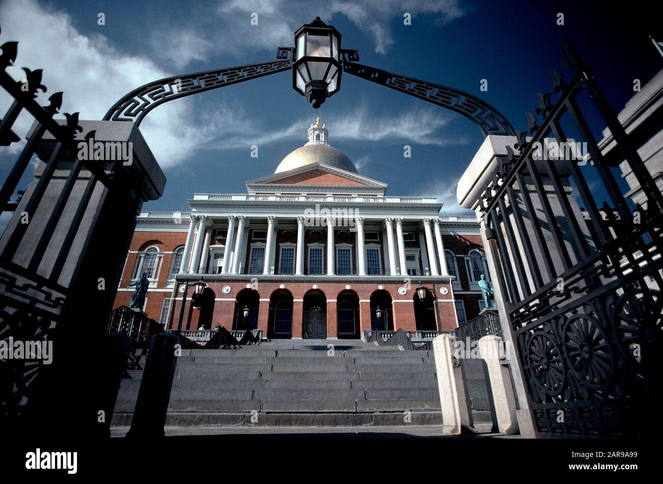 lThe Massachusetts State House is the state capitol and seat of government for the Commonwealth of Massachusetts, located in the Beacon Hill neighborhood of Boston. The building houses the Massachusetts General Court (state legislature) and the offices of the Governor of Massachusetts. The building, was designed by architect Charles Bulfinch and was completed in January 1798. It is considered a masterpiece of Federal architecture. Stock Photo