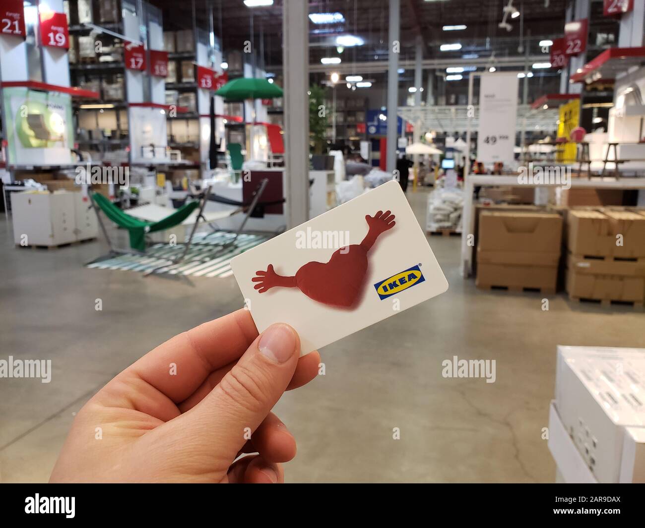 Montreal, Canada - April 10, 2019: A hand holding IKEA gift card with heart  on it, over shelf. Scandinavian chain selling ready-to-assemble furniture  Stock Photo - Alamy