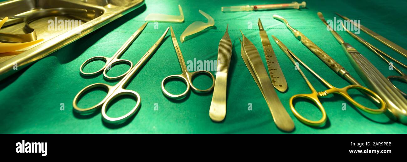 Surgical instruments, silicone nasal implants in operating room.banner size Stock Photo