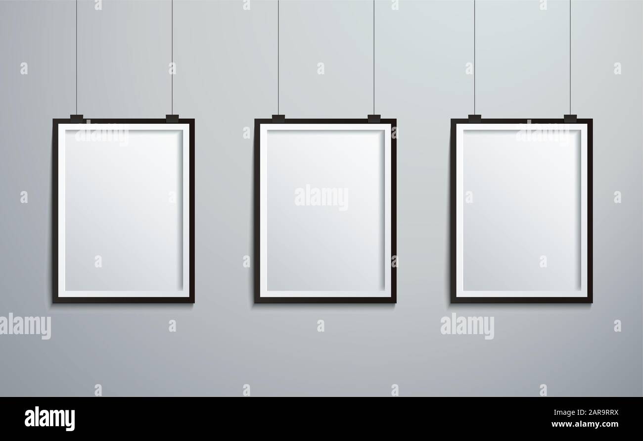 isolated picture frames hanging on wall Stock Photo Alamy