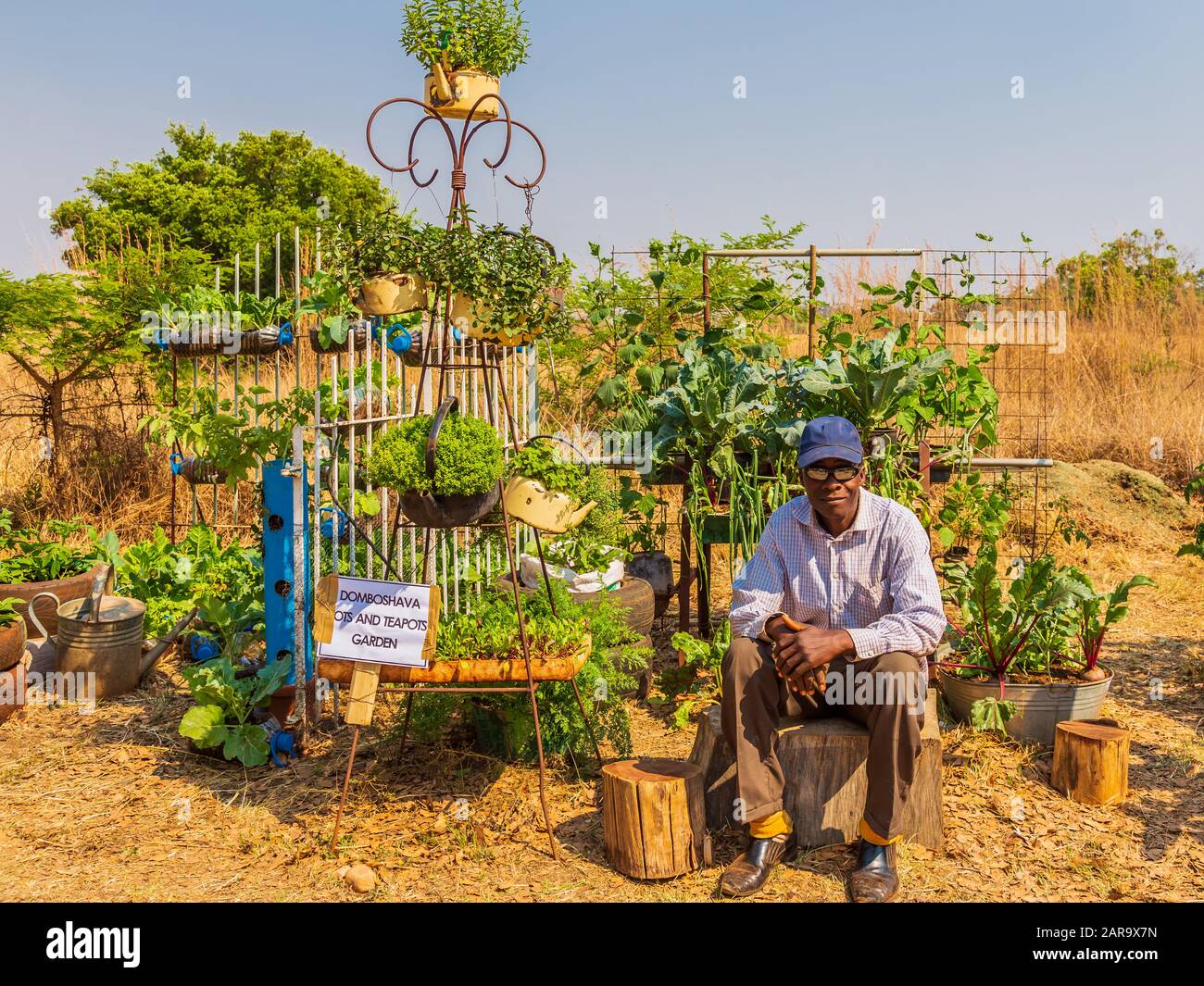 Harare, Zimbabwe, October 10, 2015: Zimbabwean man exhibiting his ideas for vertical gardening during a garden show. Stock Photo