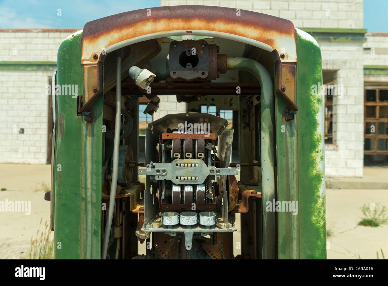 Exposed mechanism of a broken green gas pump Stock Photo Alamy