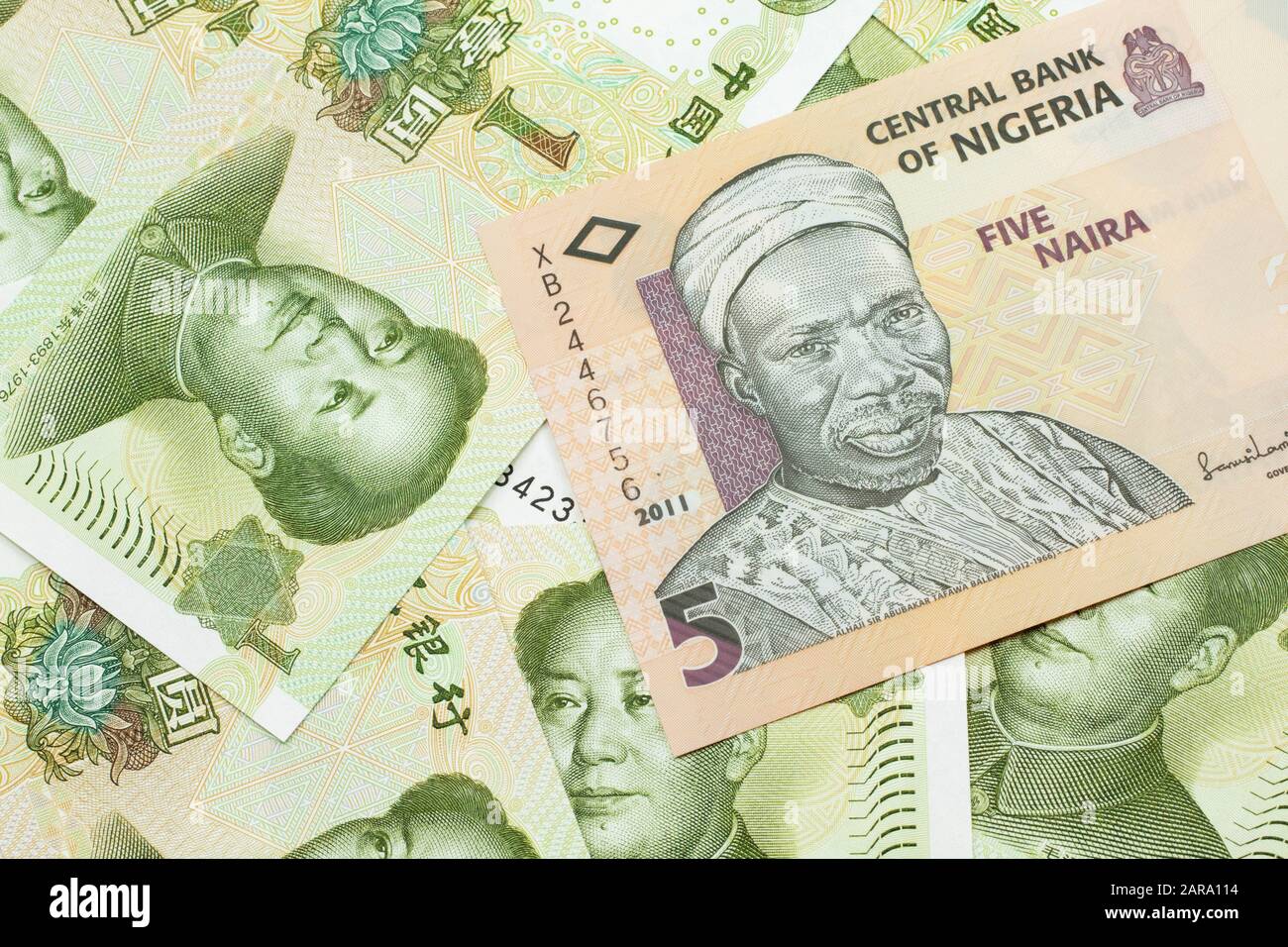 A Close Up Image Of A Peach Colored Five Nigerian Naira Bank Note On A Background Of Chinese One Yuan Bank Notes Stock Photo Alamy